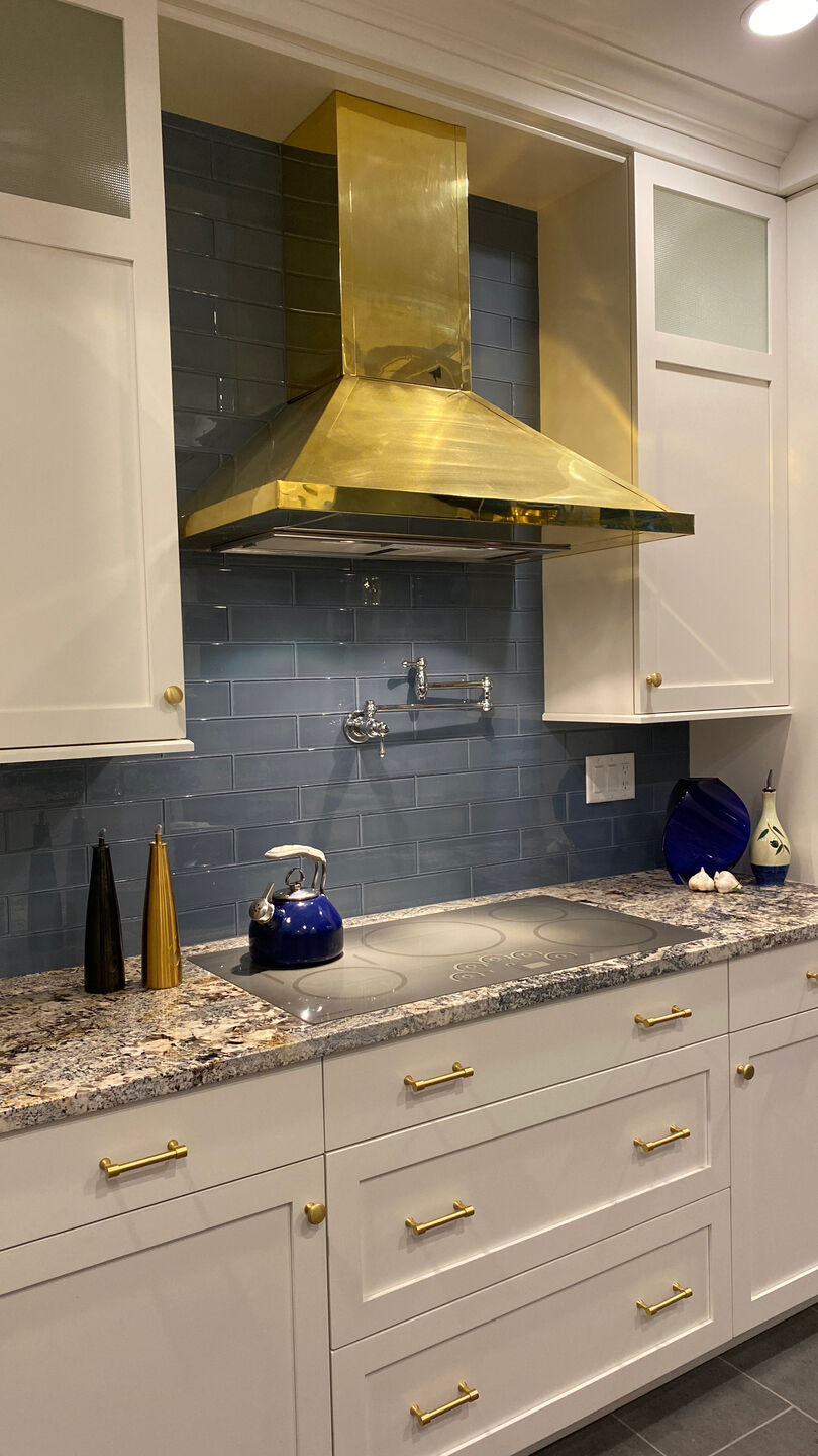 Amoretti Brothers brass kitchen range hood