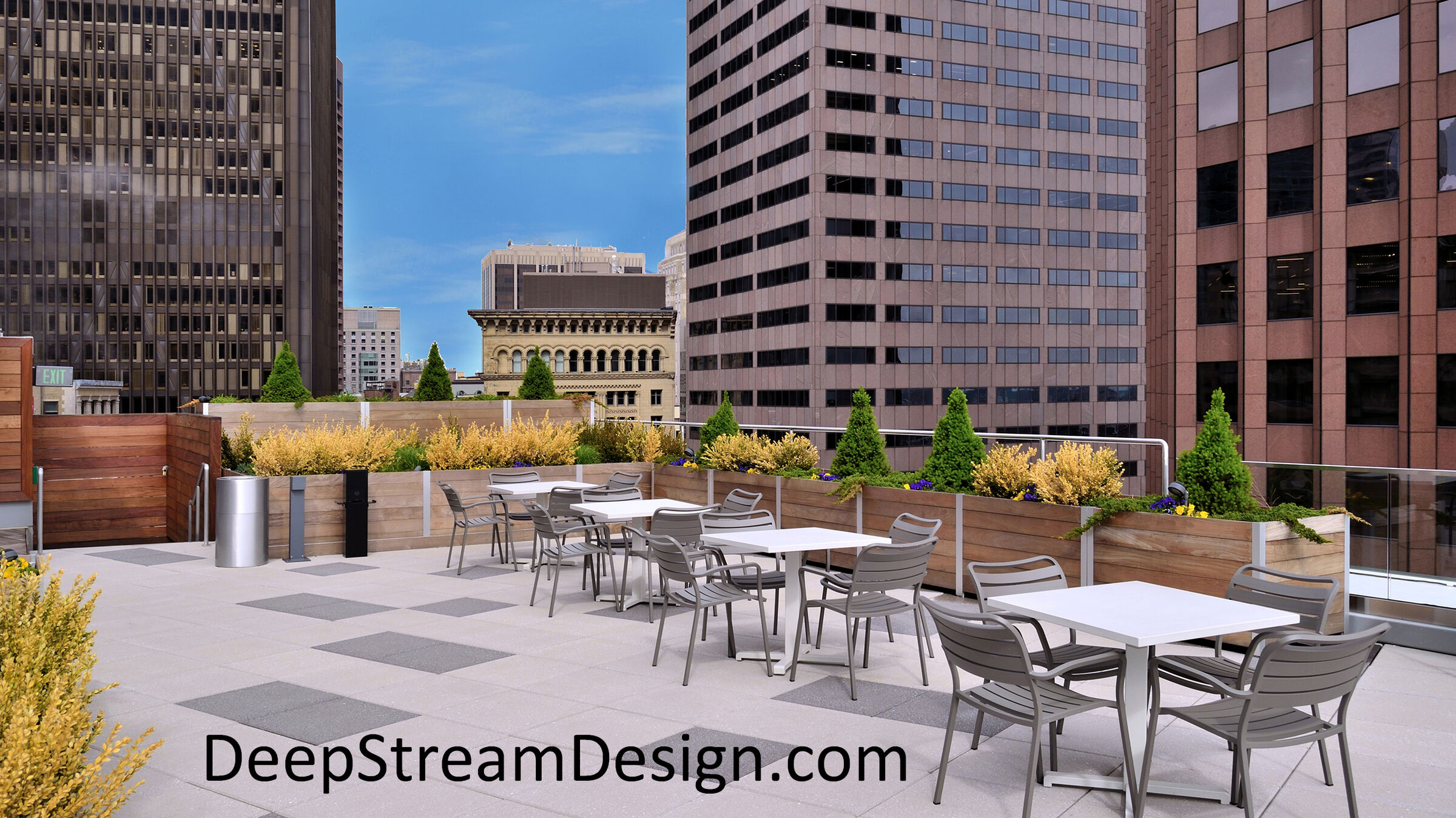 Trademark Mariner anodized aluminum extrusions hold tropical hardwood planks, creating a façade that contains waterproof liners, advanced directed drainage, and drip irrigation systems. No roof penetrations are necessary.