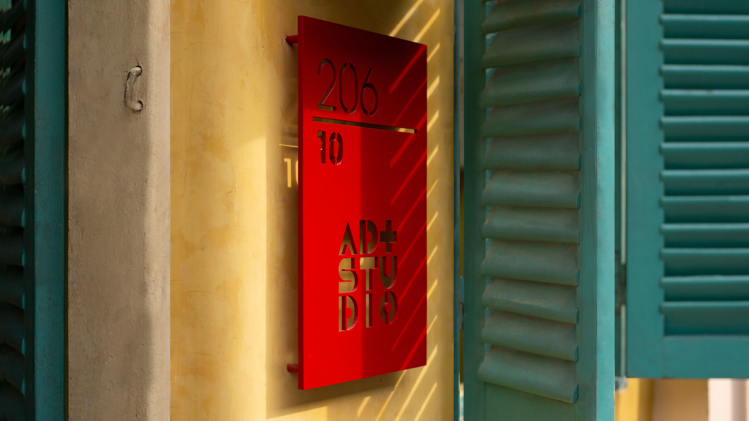 The exterior colors are inspired by the indigenous Chinese buildings in Cho Lon, Saigon.