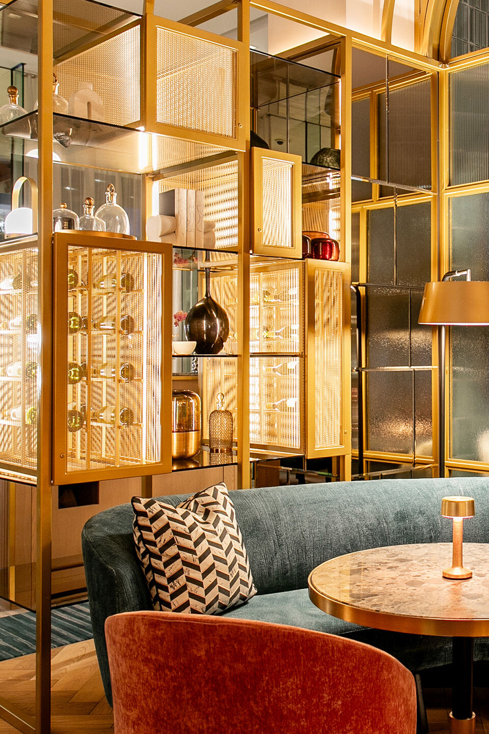 Banker Wire SPZ-52 in Plated Satin Brass featured in the Astra restaurant interior design in San Francisco