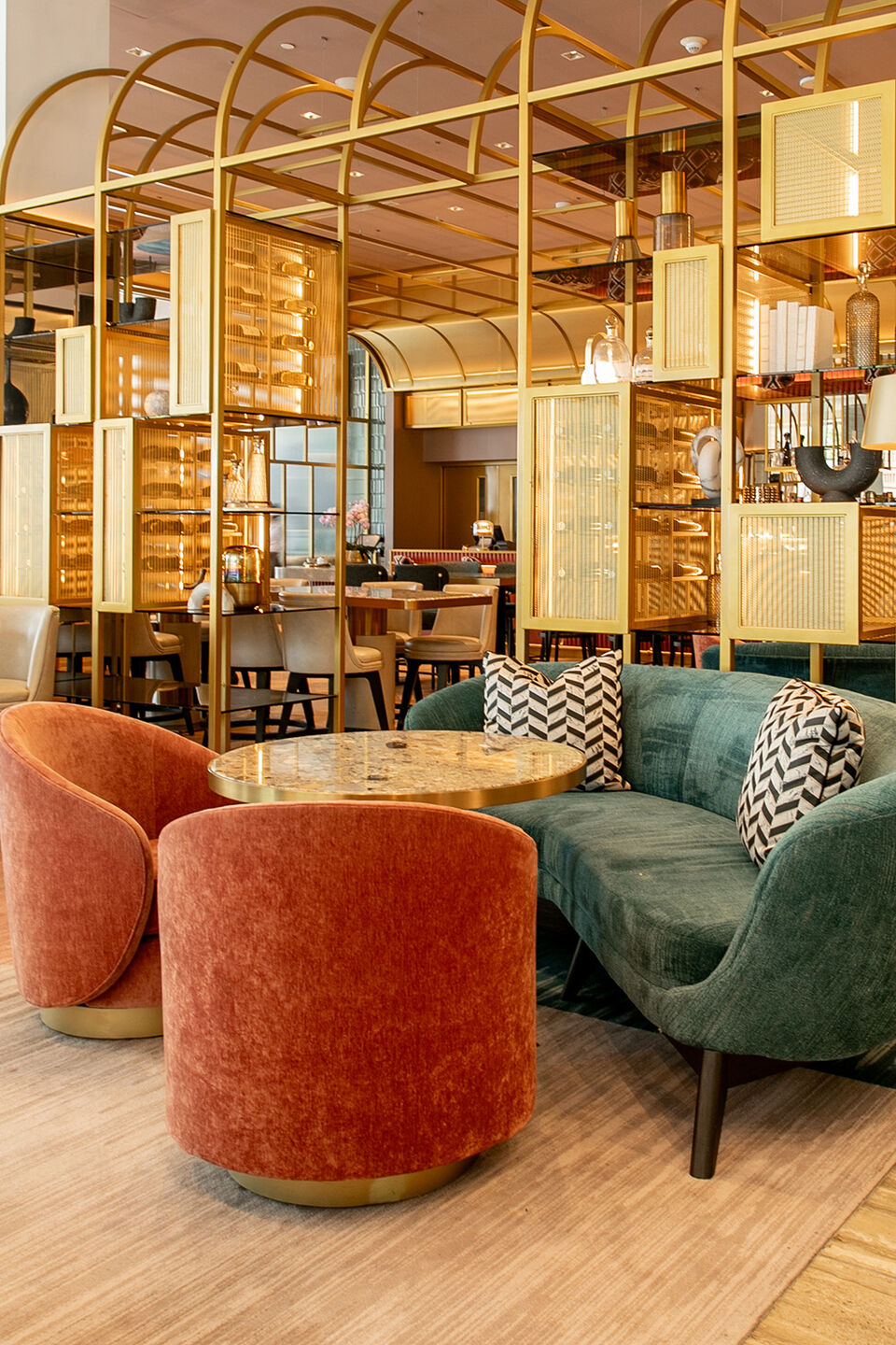 Banker Wire SPZ-52 in Plated Satin Brass featured in the Astra restaurant interior design in San Francisco