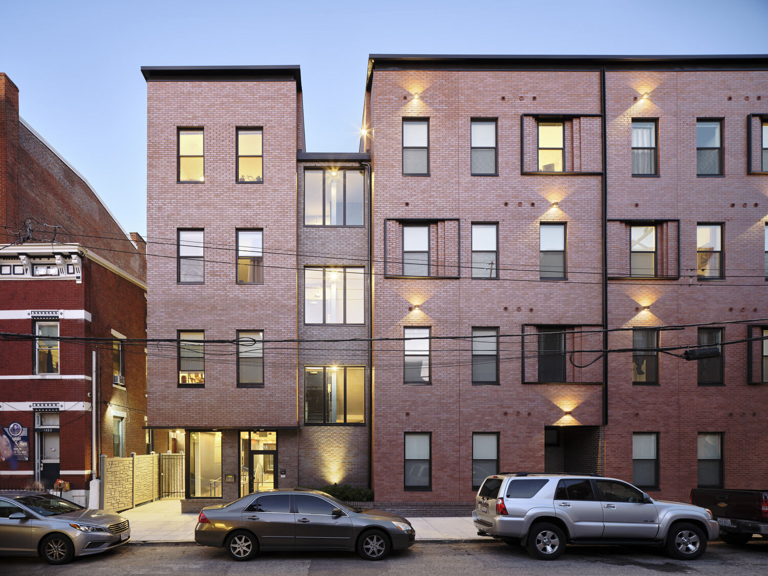 Willkommen on Republic uses its large glass lobby, stairs, and stoops to connect residents to their neighbors. Revealing the activity on a narrow street that sometimes has felt shuttered, it announces, “We’re home, let’s get to know each other!”