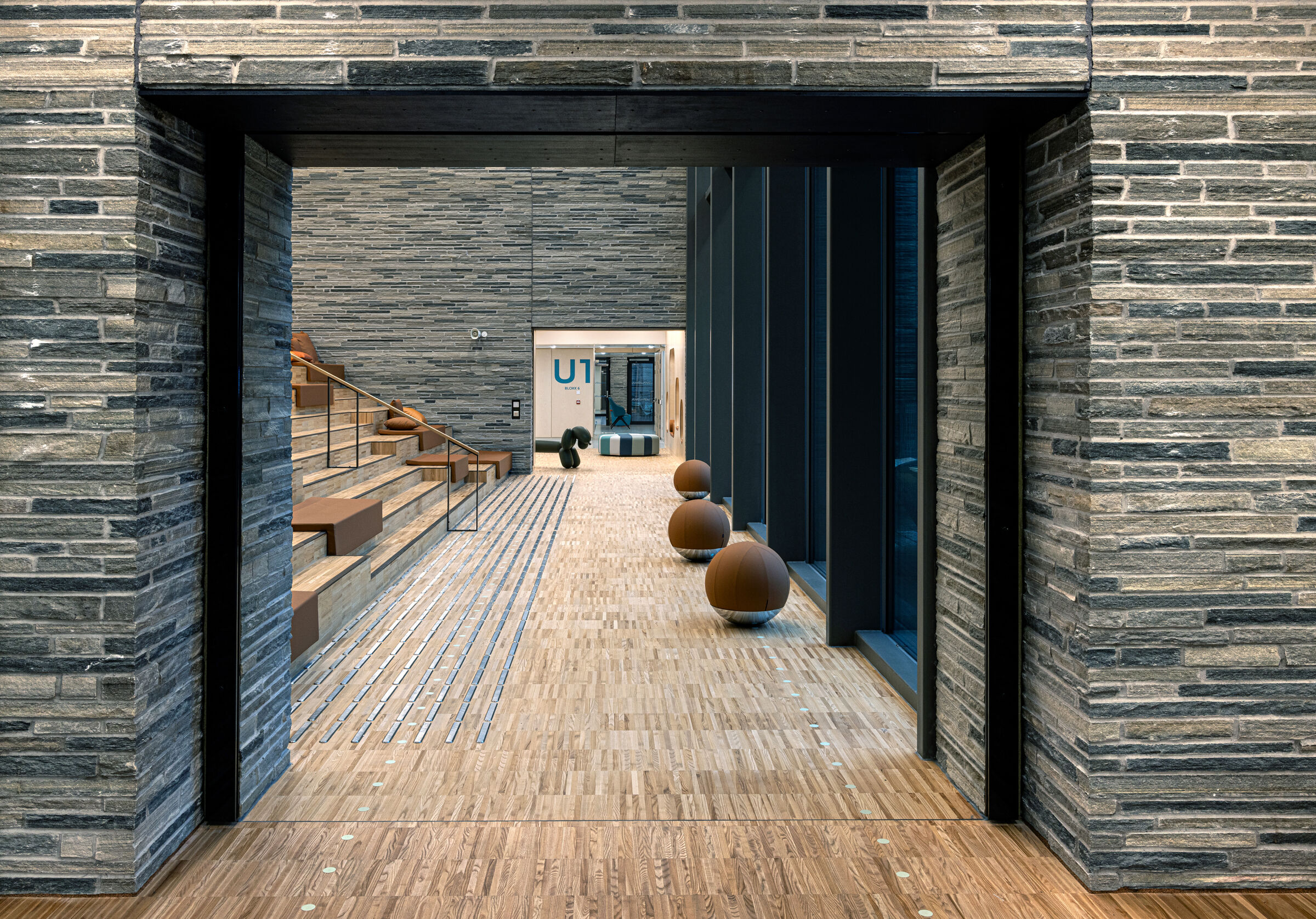 Natural materials connects Glasblokkene with the surrounding Norwegian landscape