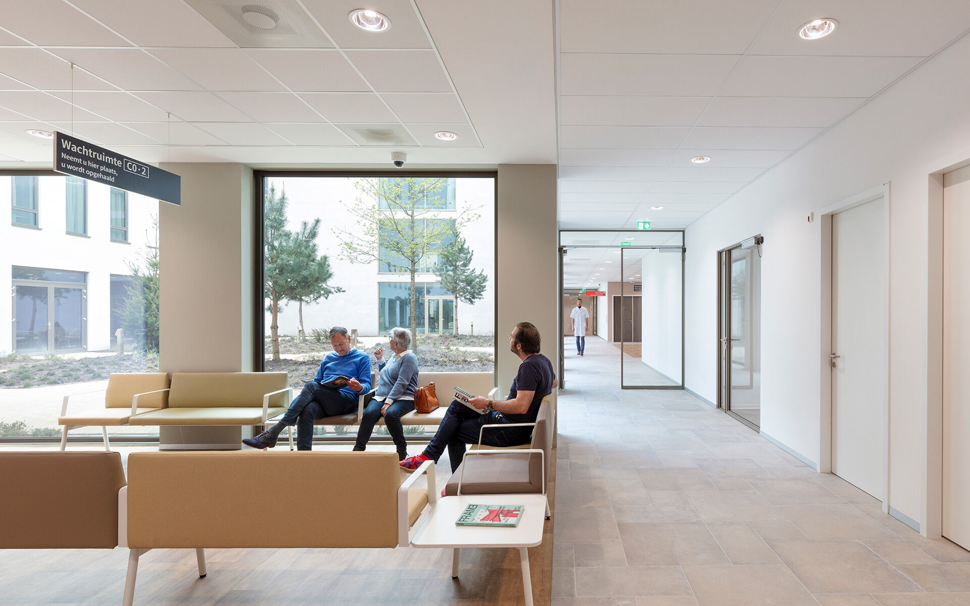 Waiting room for the outpatient clinic with a view of one of the patios
