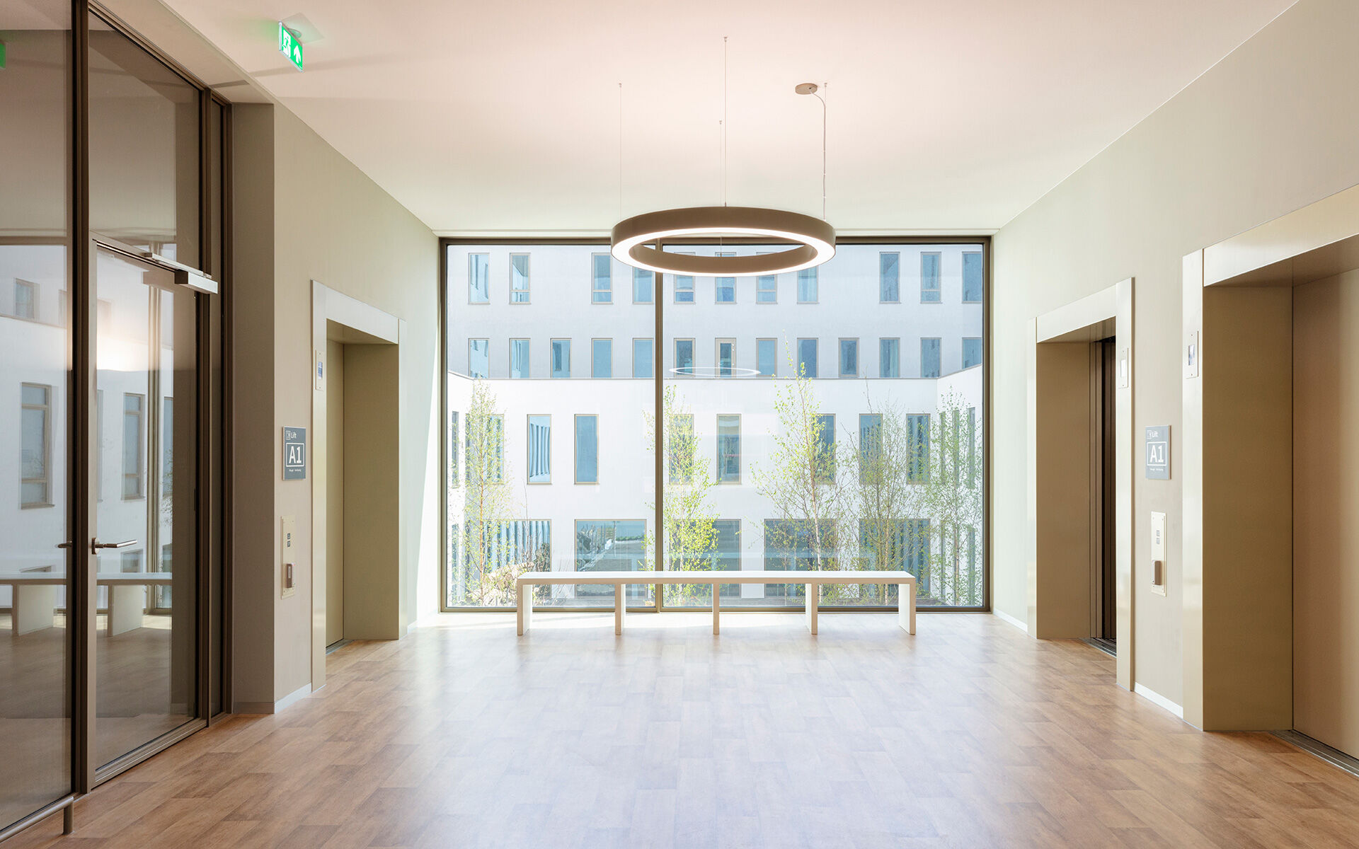 Lift area with a generous window overlooking the patio