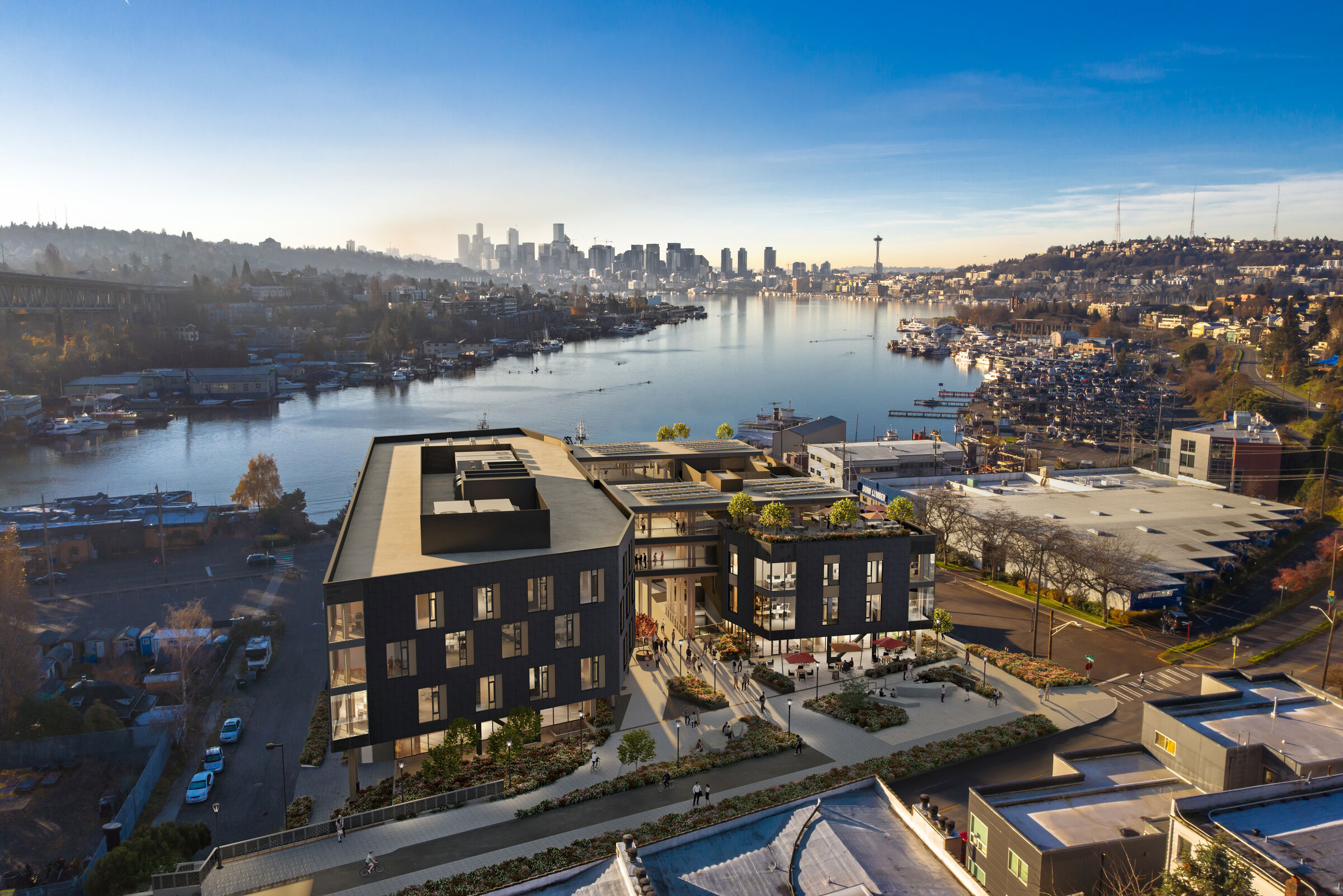 As an ambitious full-block project, it encompasses pedestrian and bike trail connections, a stormwater treatment facility, and a public plaza as a neighborhood destination and gathering point.