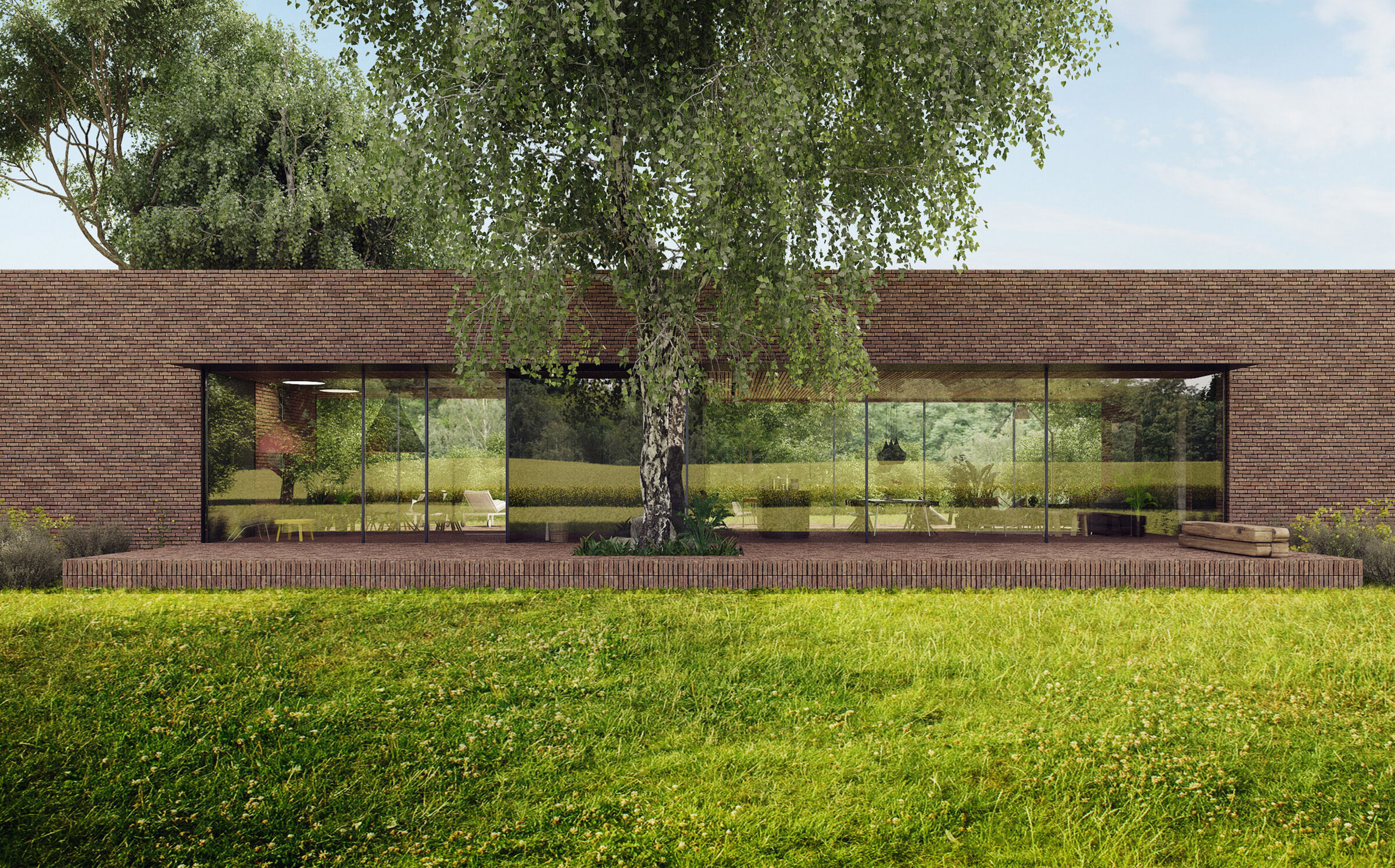 An elongated brick rectangle, placed on a hill by the lake, creates a horizontal line that frames the landscape through centrally placed, double-sided glazing.