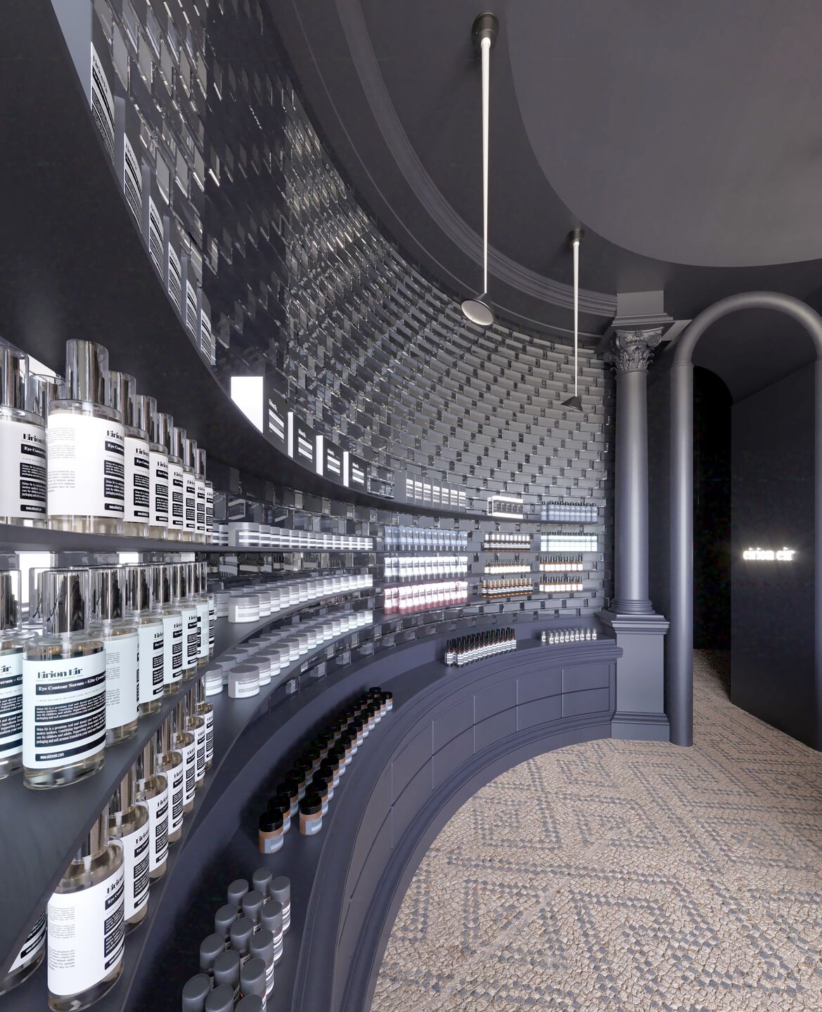 Curved black walls lined with glass-ceramic textures envelop the visitor like a whisper.