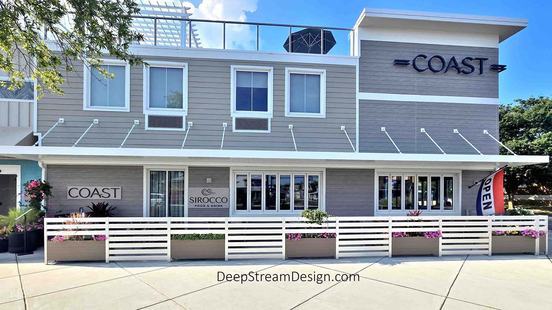 Modern Restaurant Planter Screen Wall Barrier for Hotel Sidewalk Cafe. Low maintenance with inner liner providing a thermal barrier and advanced drainage supported by an anodized aluminum frame. Lifetime Structural Warranty