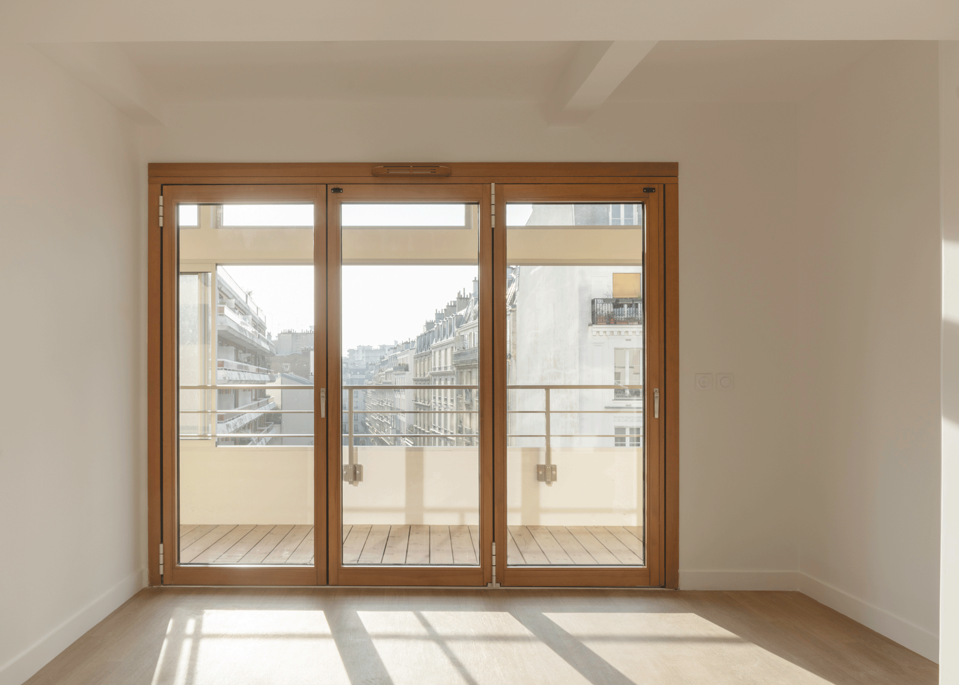 A bi-folding door consists of three elements that open inward and fold into a slim bundle at either the left or the right, depending on the installation situation.