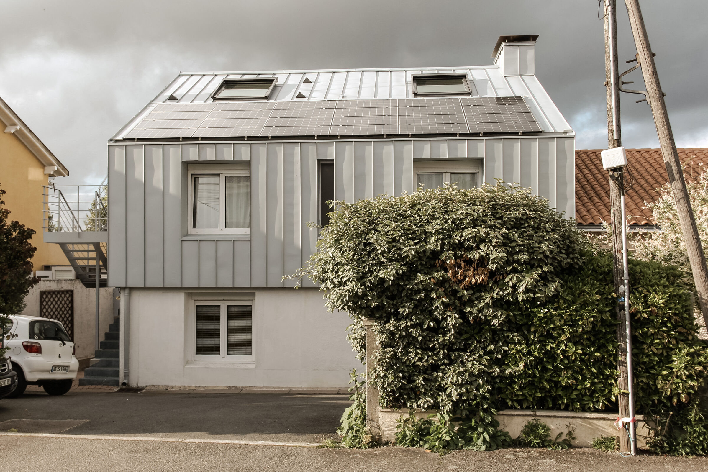 Bureaux et logements FV – Surélévation en zinc Azengar.