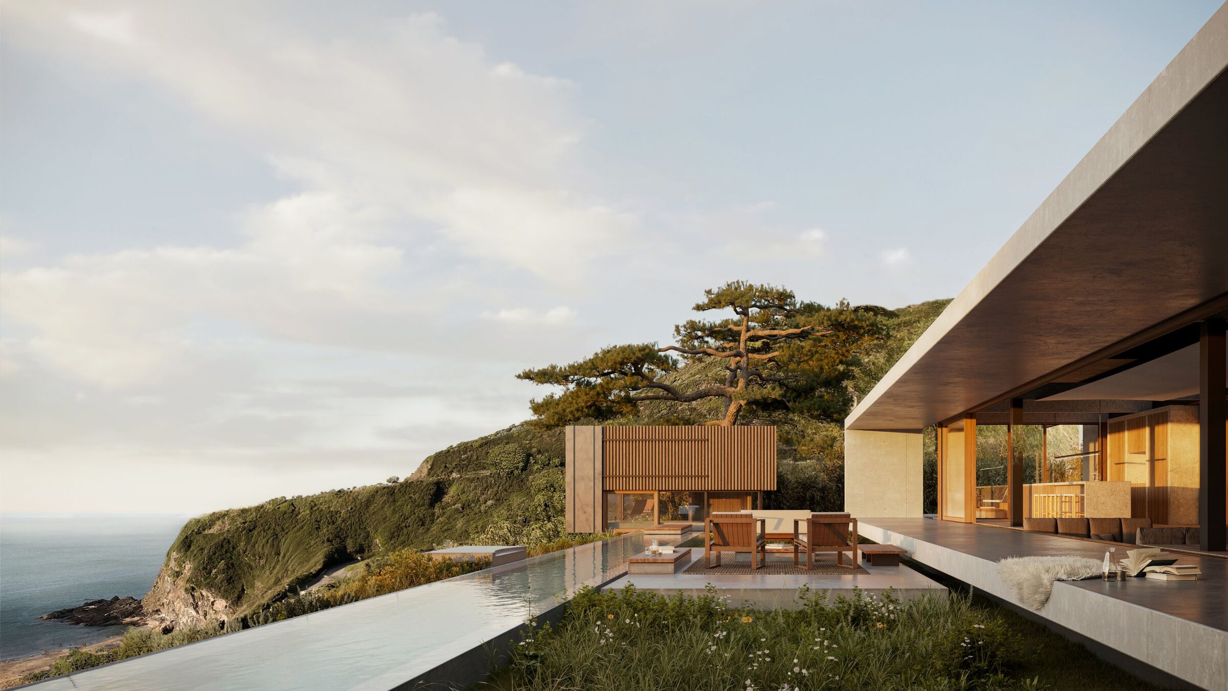A concrete portal frame acts as a unique outdoor living space, overlooking the infinity pool and view.