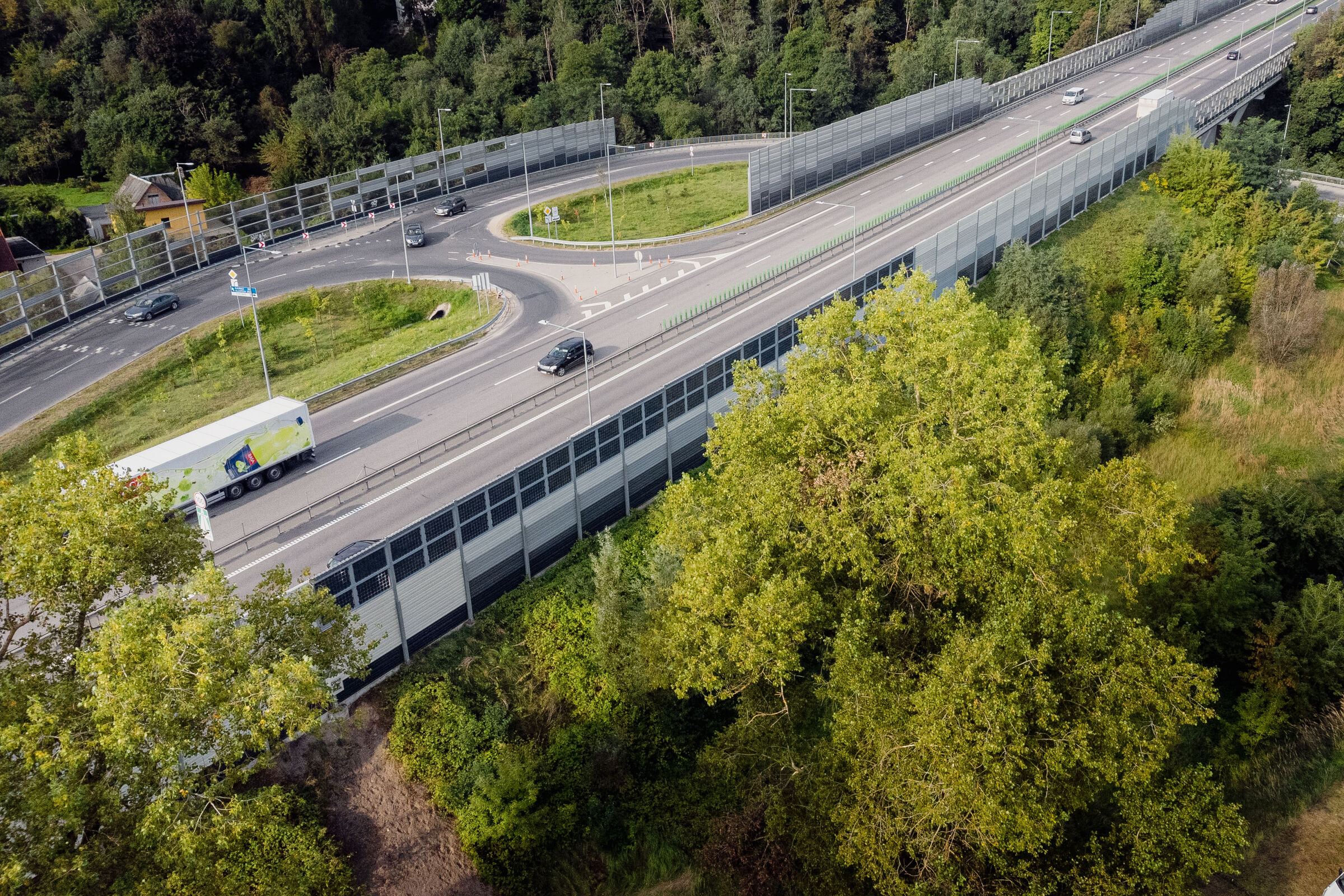 sound barrier with integrated solar panels near highway in Vilnius, Lithuania