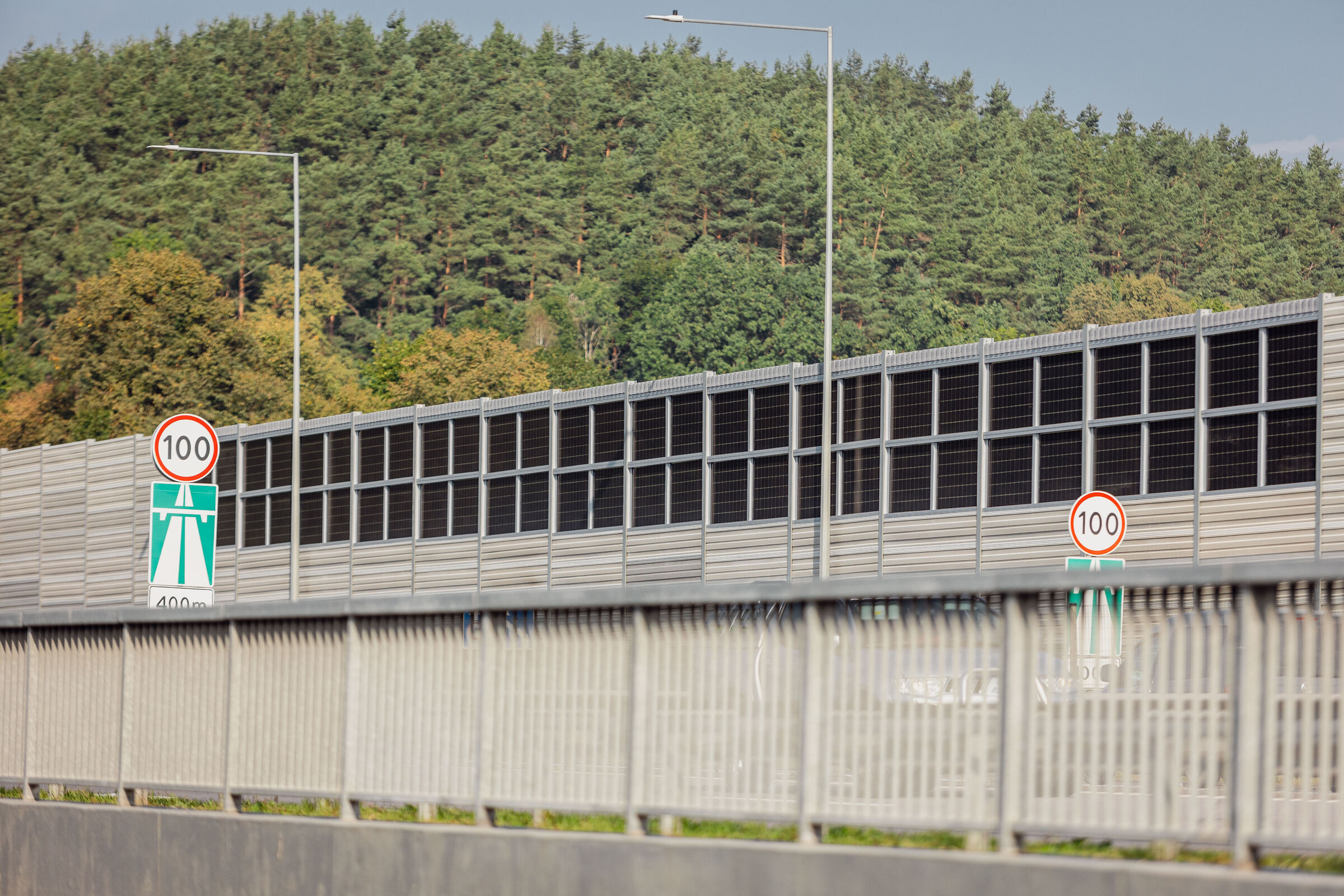 sound barrier with integrated solar panels near highway in Vilnius, Lithuania