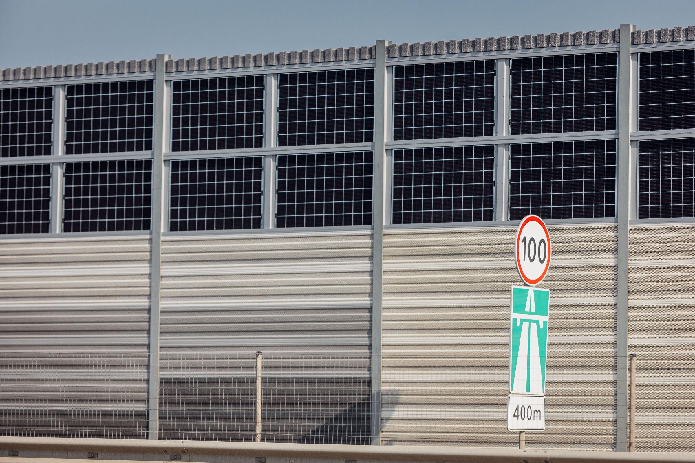 sound barrier with integrated solar panels near highway in Vilnius, Lithuania