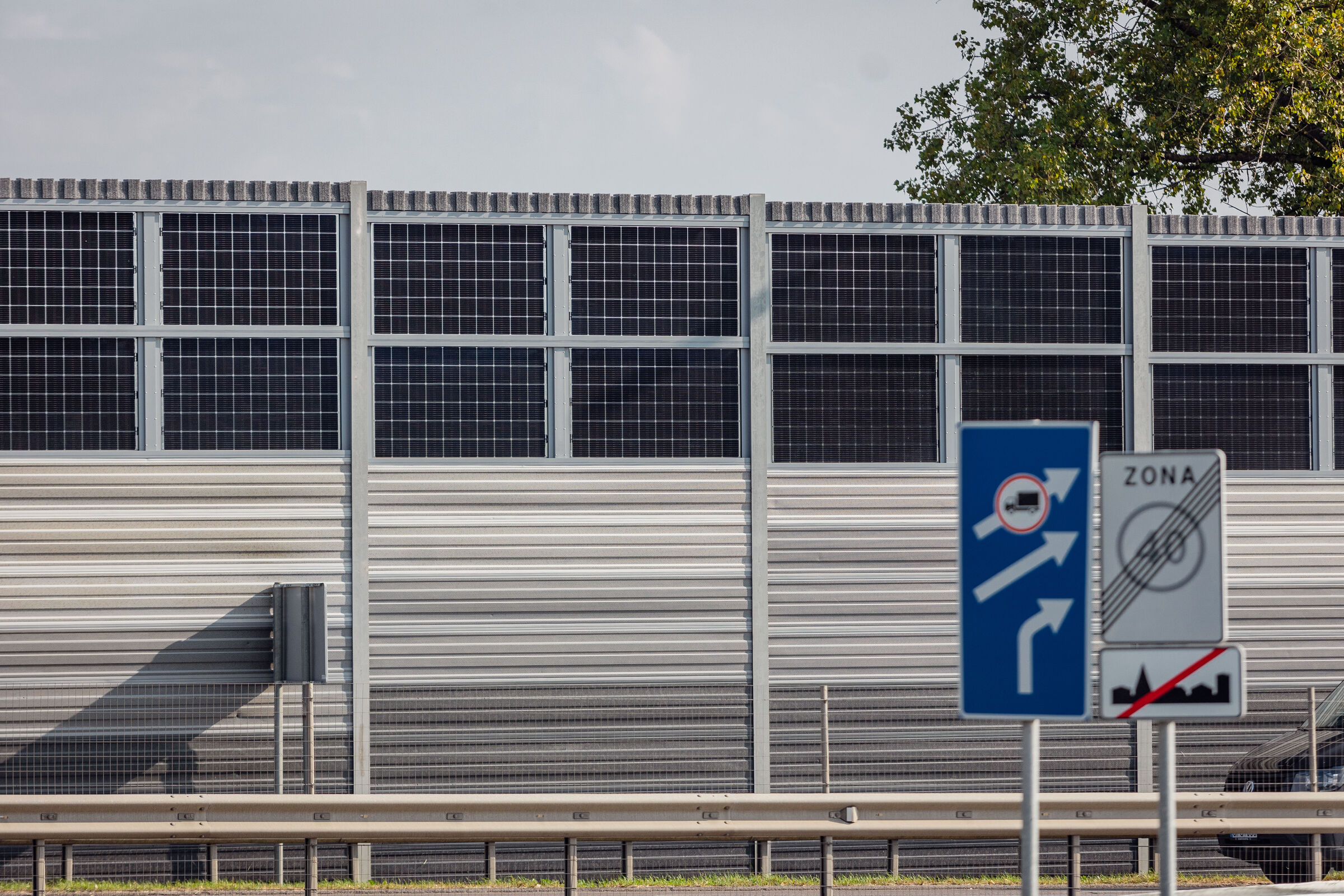 sound barrier with integrated solar panels near highway in Vilnius, Lithuania