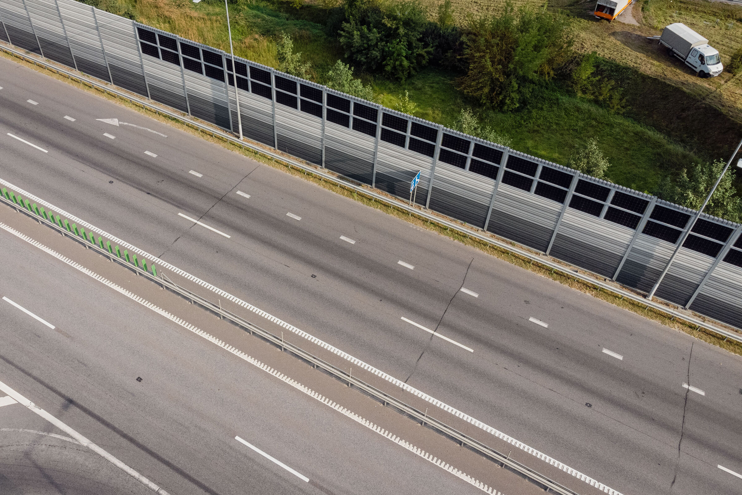 sound barrier with integrated solar panels near highway in Vilnius, Lithuania