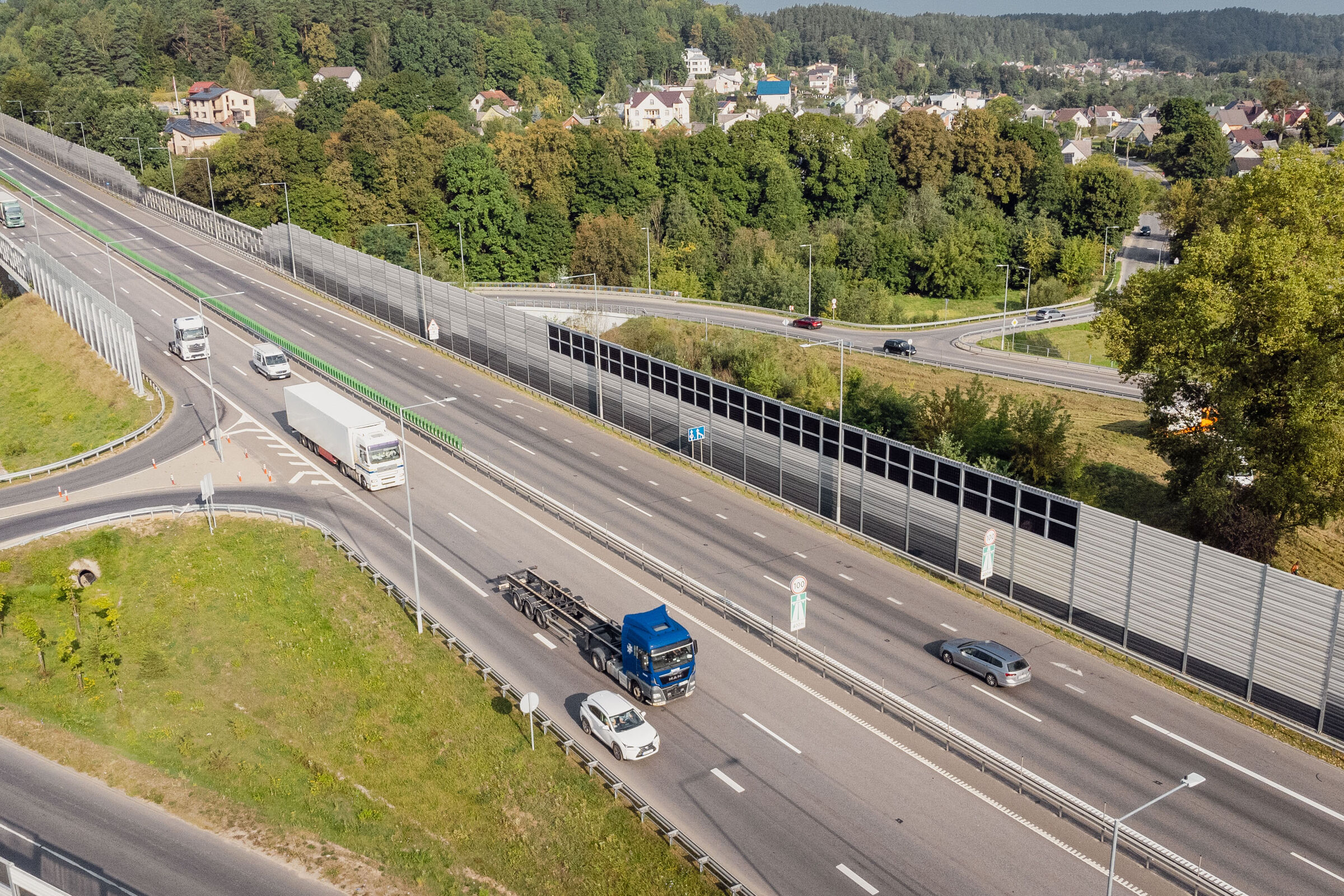 sound barrier with integrated solar panels near highway in Vilnius, Lithuania