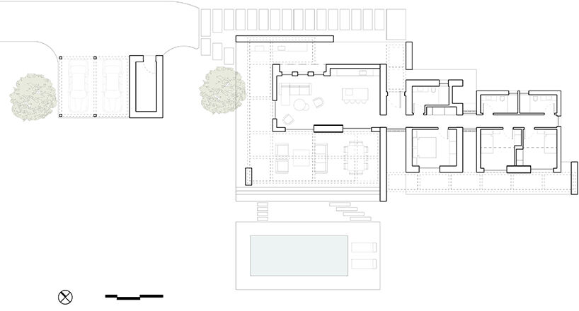 Floor plan illustrating the linear organization of social and private spaces along a single axis, with shaded outdoor terraces extending the interior programs