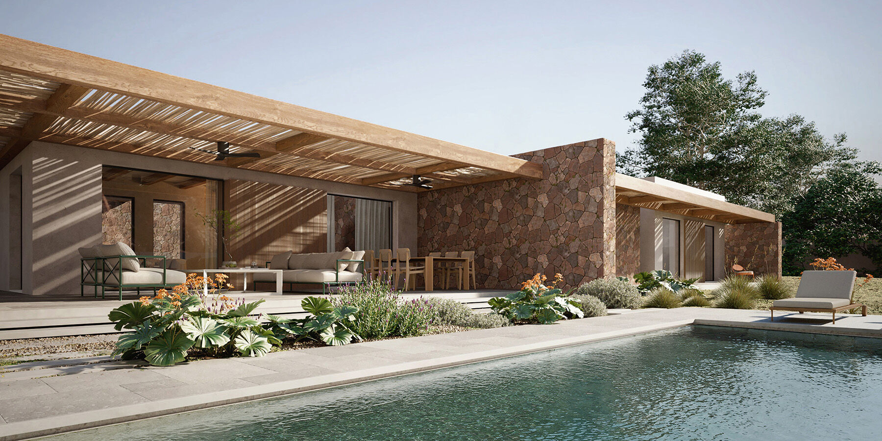 View toward the living and dining veranda, where filtered sunlight animates the timber structure and stone cladding. copy