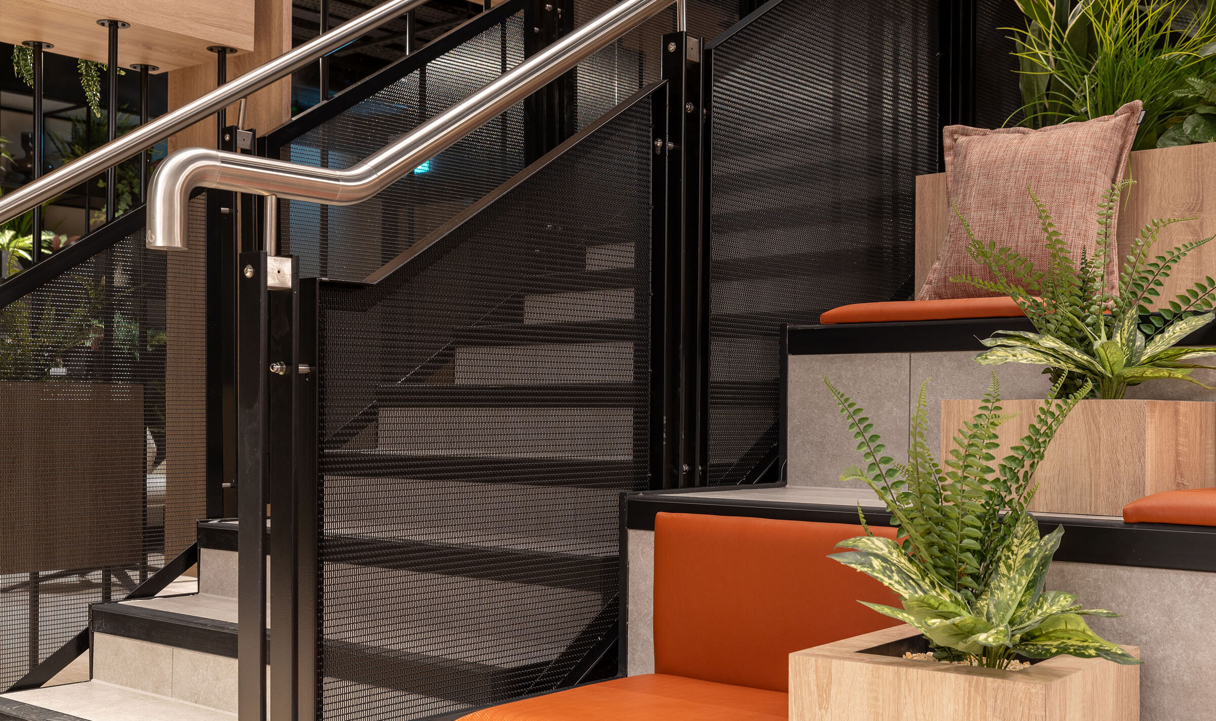 Banker LPZ-71 architectural wire mesh enhances staircase design with clean lines, durable materials, & a contemporary look ideal for residential & commercial spaces.