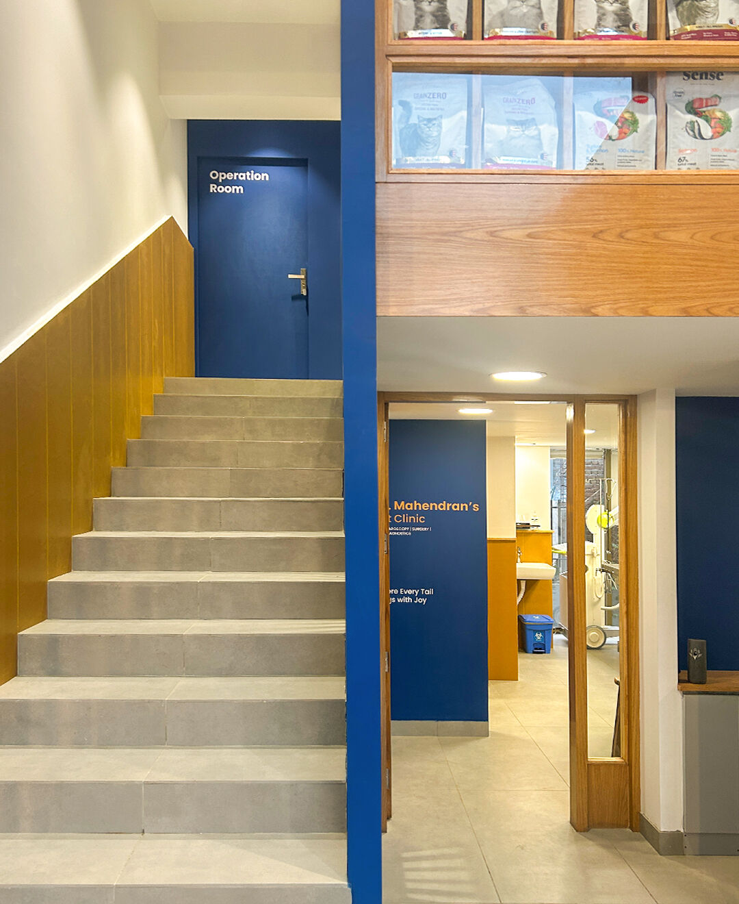 The staircase goes up from the reception, with the treatment room located on the lower floor beside it