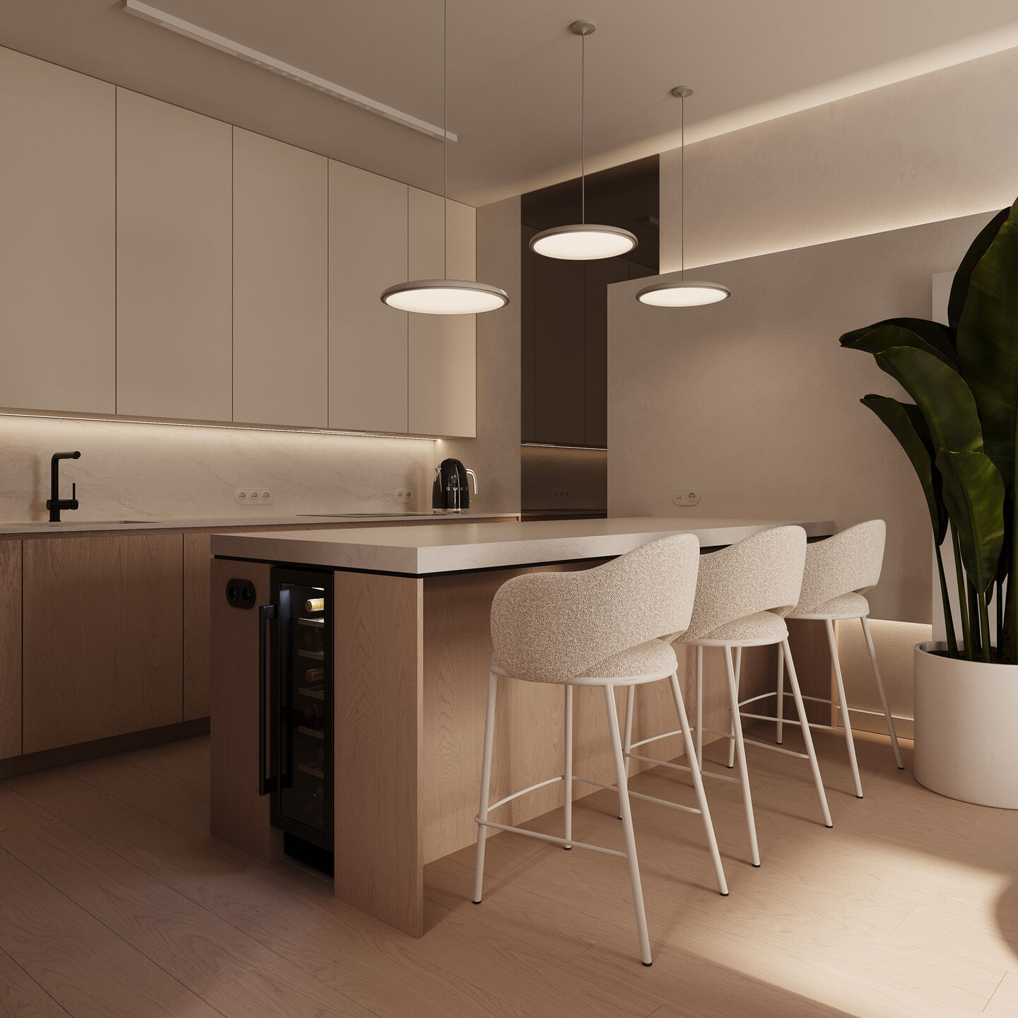 The kitchen island acts as both a workspace and a social anchor within the apartment’s open layout.