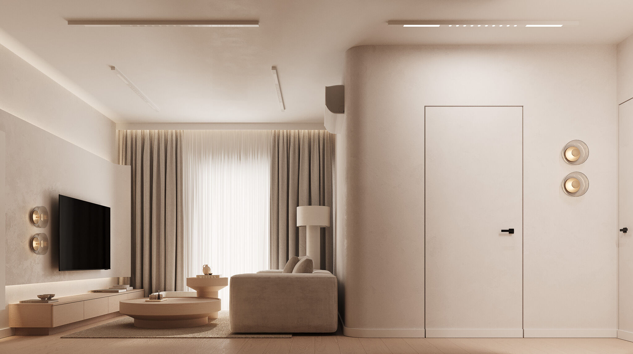 Curved walls and minimal detailing guide movement through the apartment, enhancing spatial continuity.
