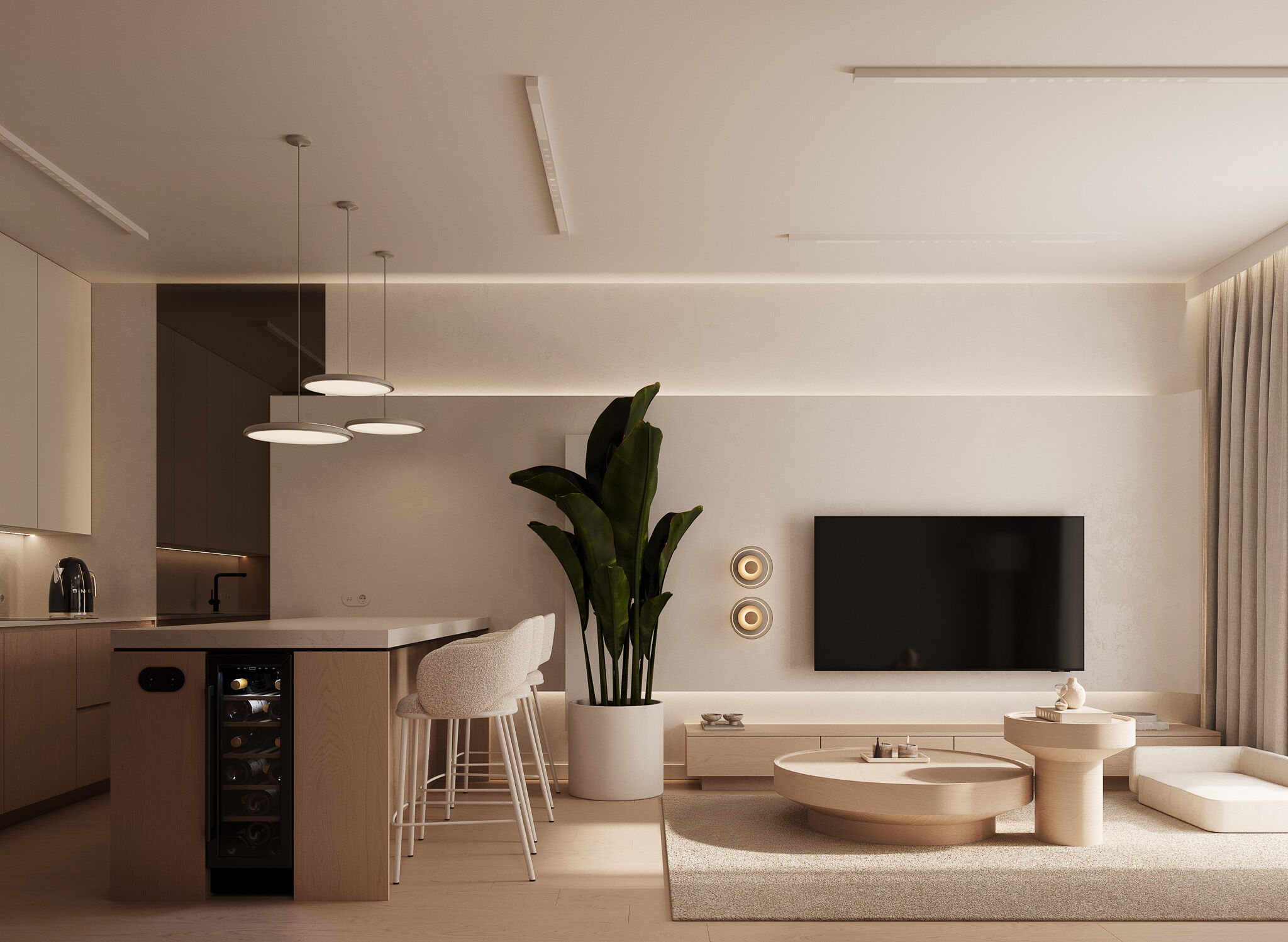An open kitchen and living space organized around a central island, balancing functionality with visual clarity.