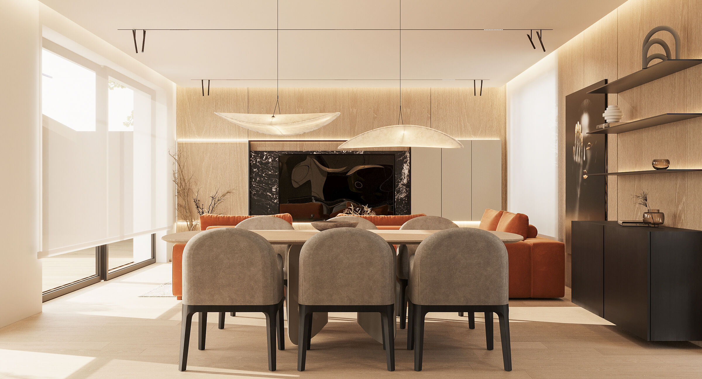 A central dining area anchors the interior, connecting living and kitchen zones into one continuous sequence.