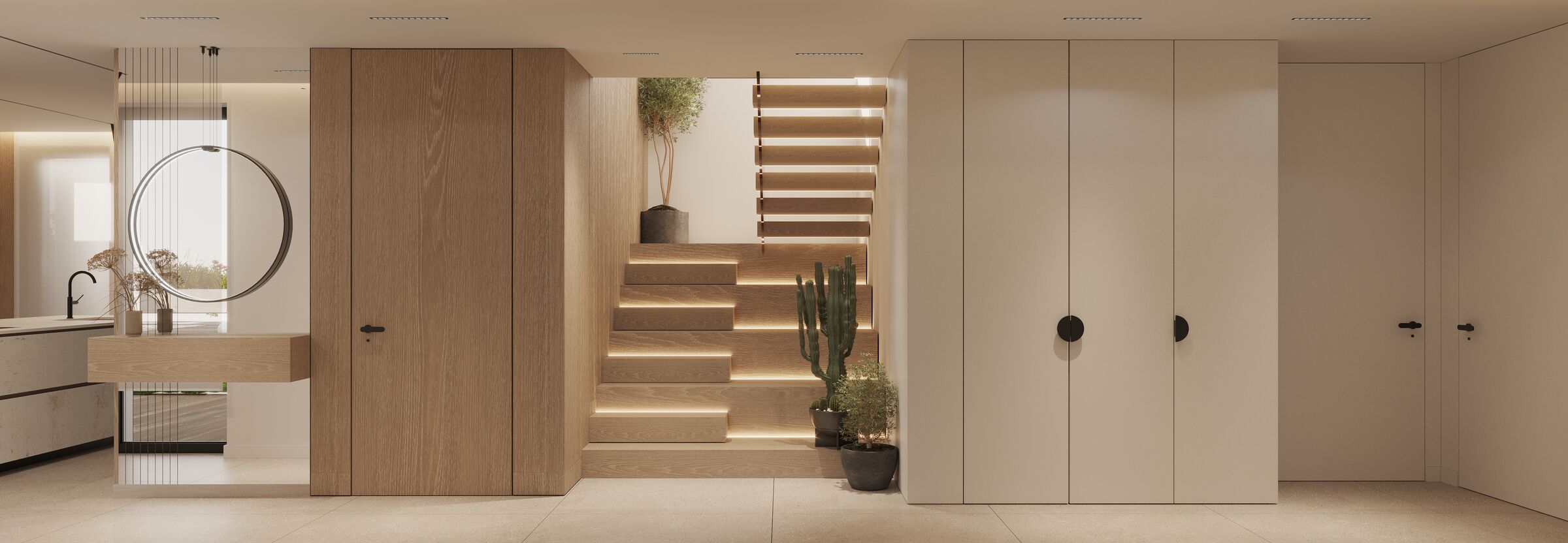 A sculptural staircase becomes a central spatial element, guiding movement through light and proportion.