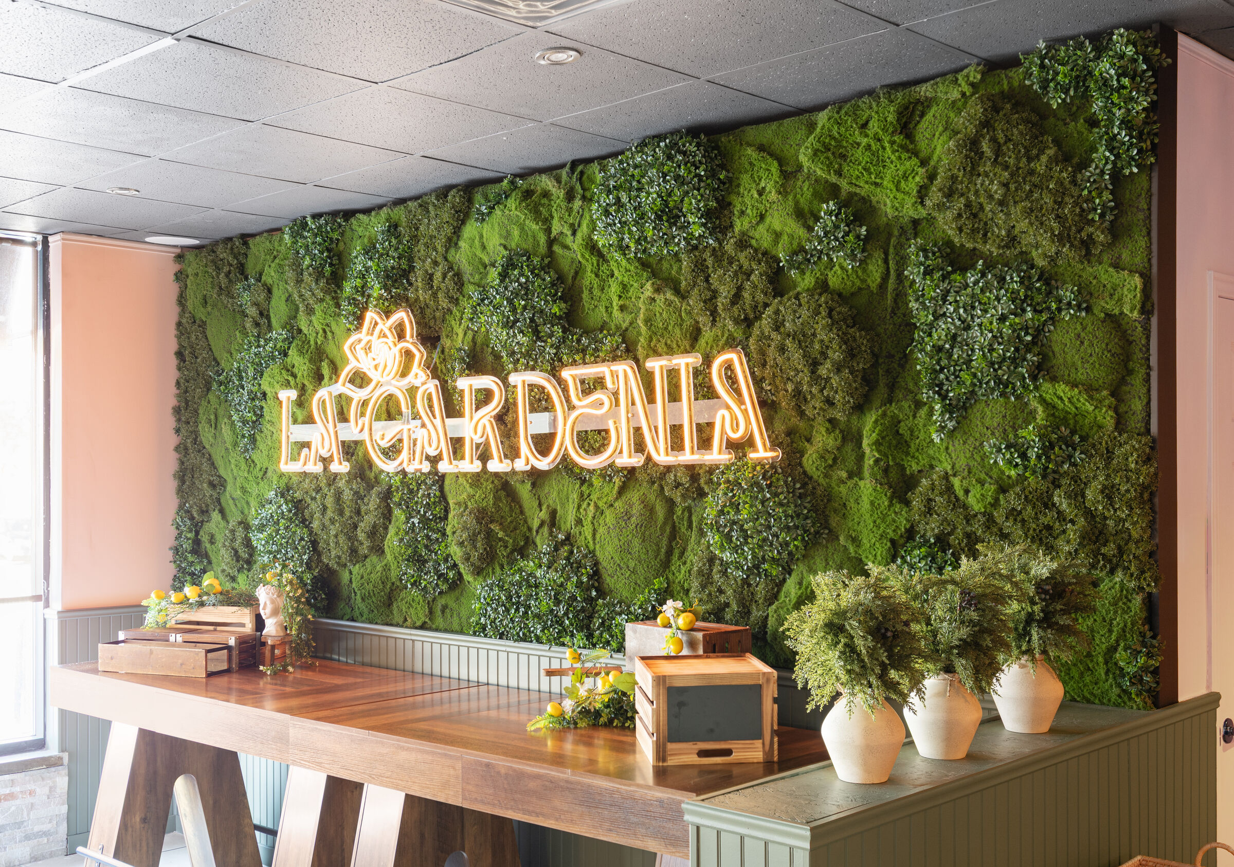Plant wall with logo