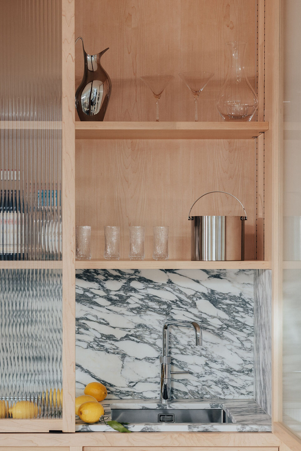 Arabescato offcuts & maple forms a new bar