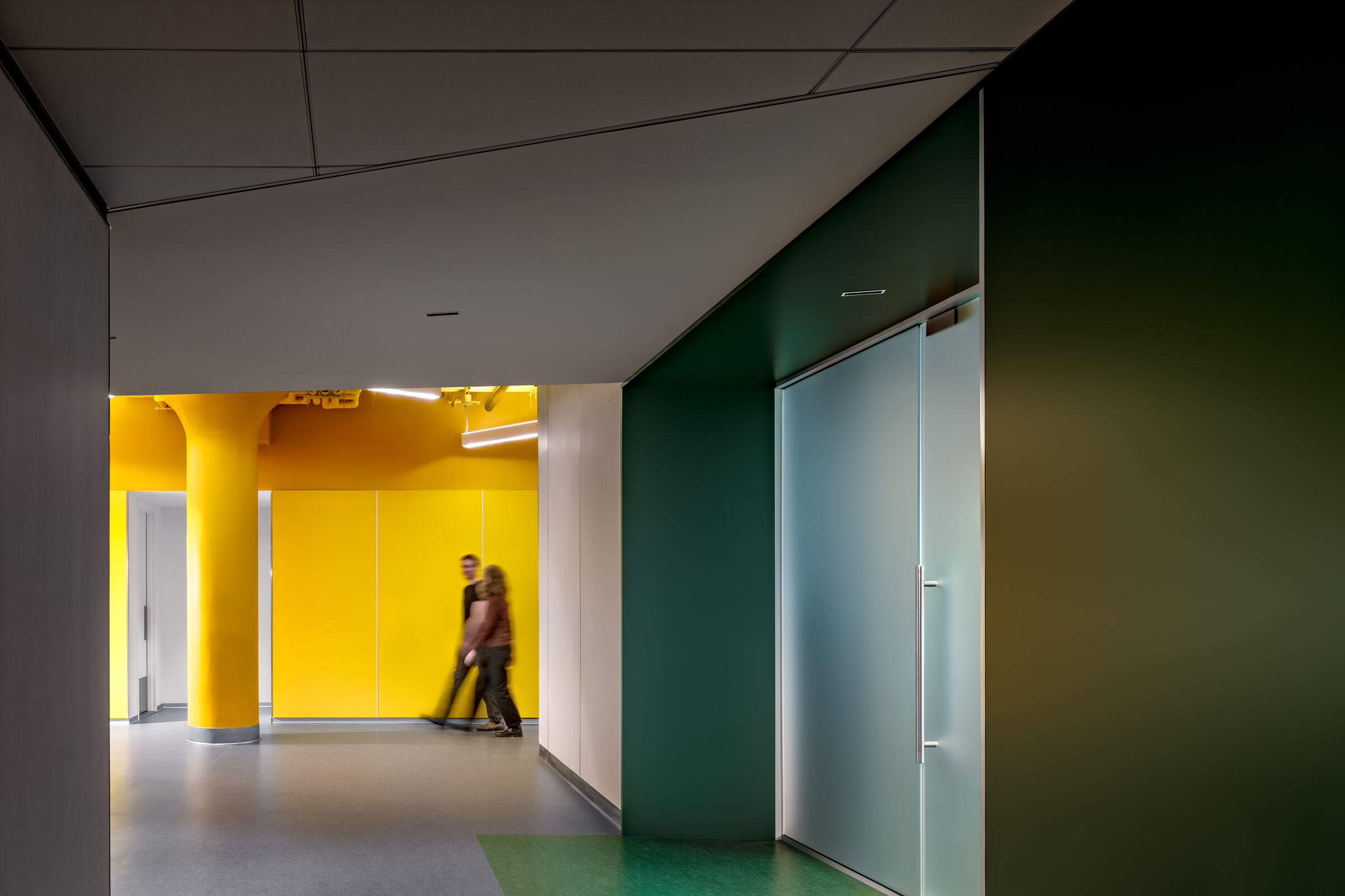 The design includes a material and color palette that is customized for each administrative entity’s suite, providing a sense of identity and wayfinding for all users.