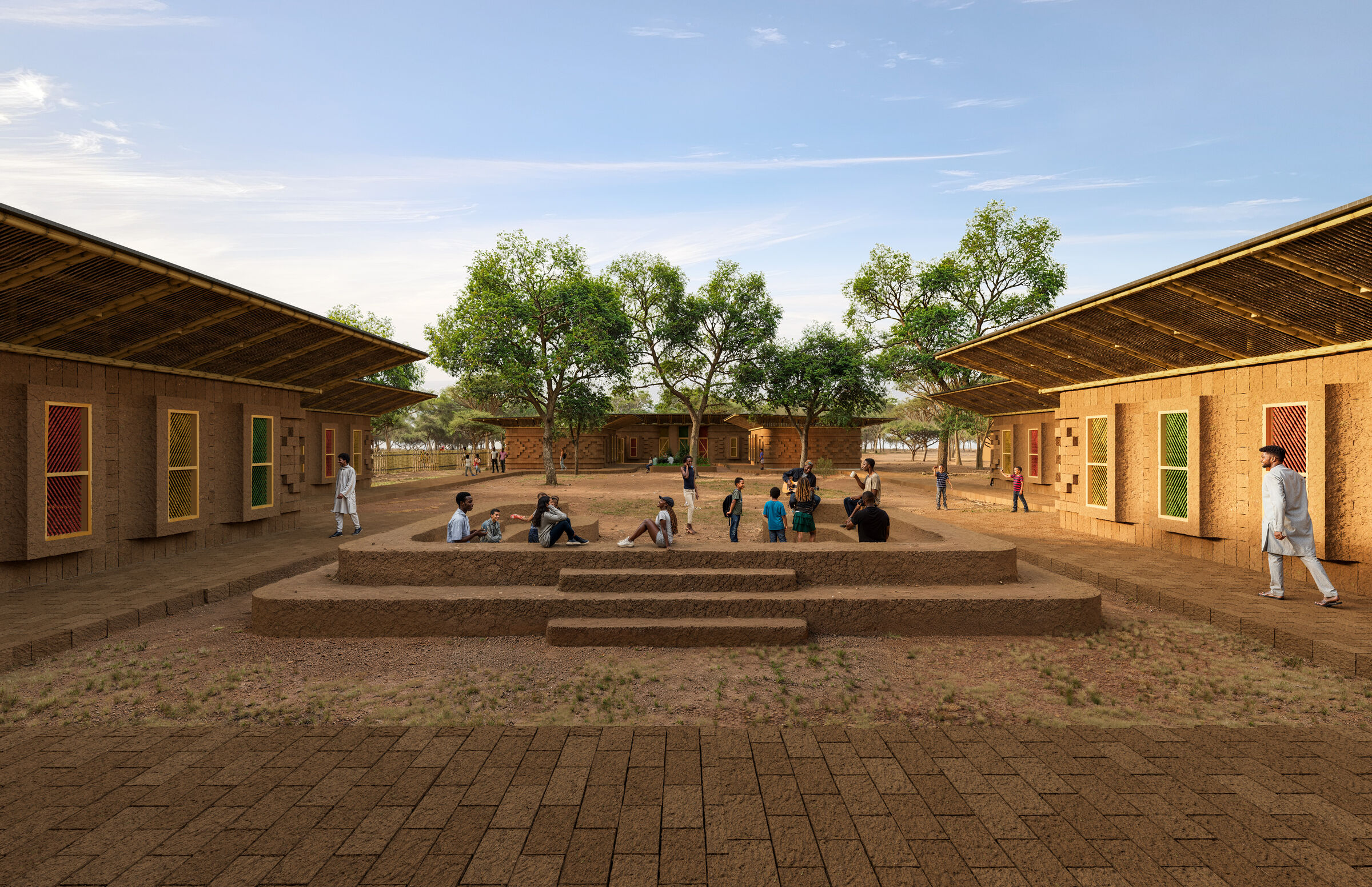The buildings surround an open recreational plaza.