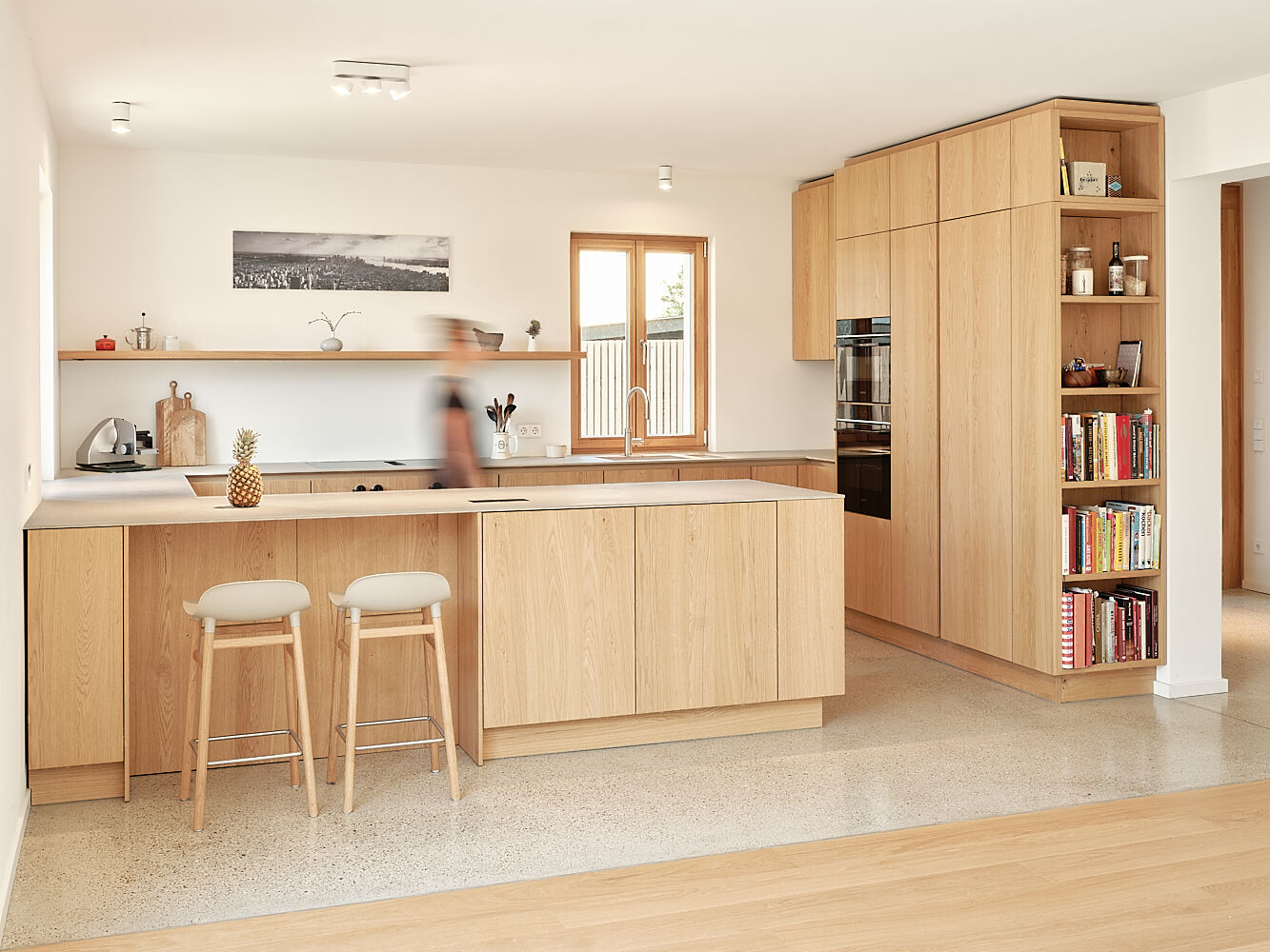 kitchen with oiled oak cabinets and terrazzo flooring