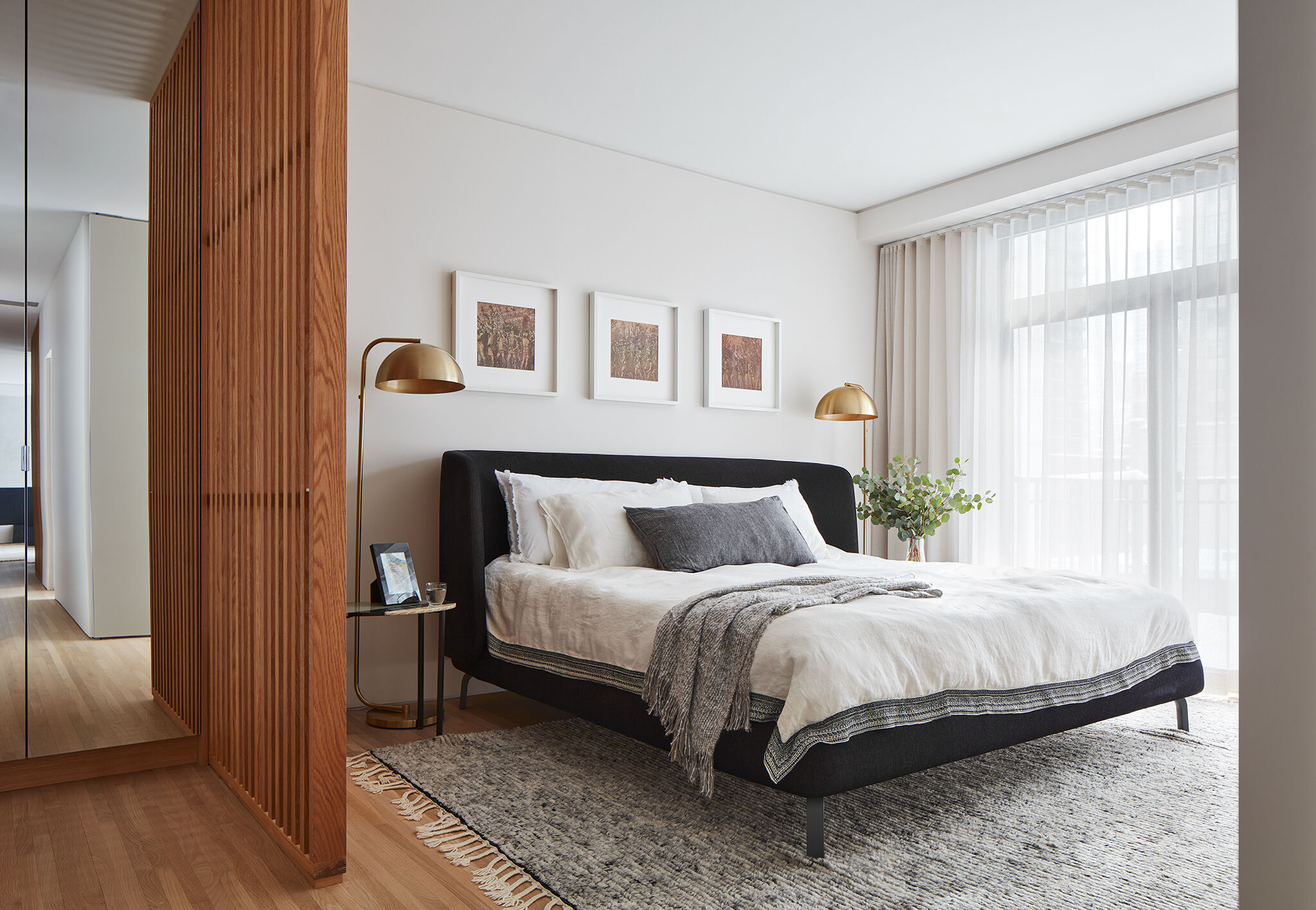 Layered and bright bedroom.