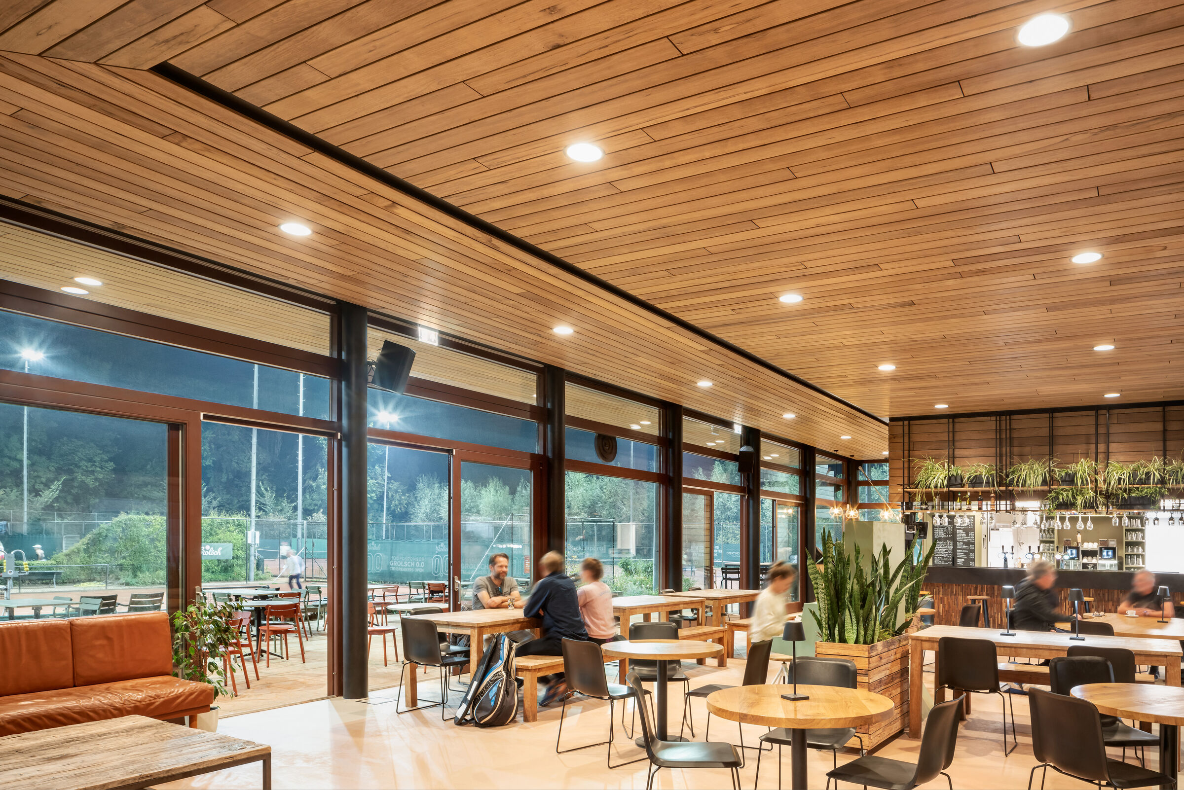 Clubhouse bar with view towards tennis courts