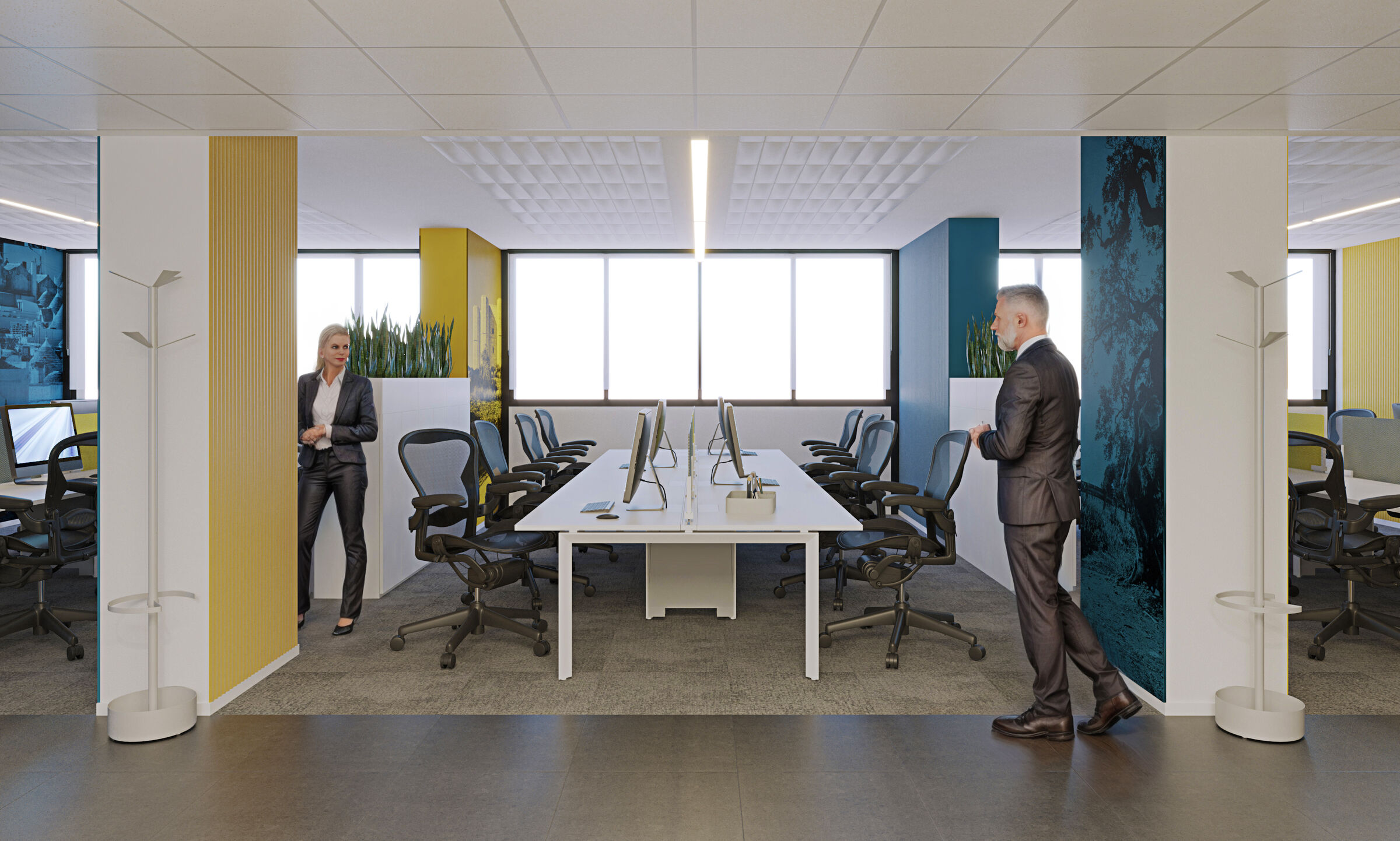 An open-plan workspace with individual workstations and EY-inspired yellow accents: the glass walls let natural light flood into the floor.