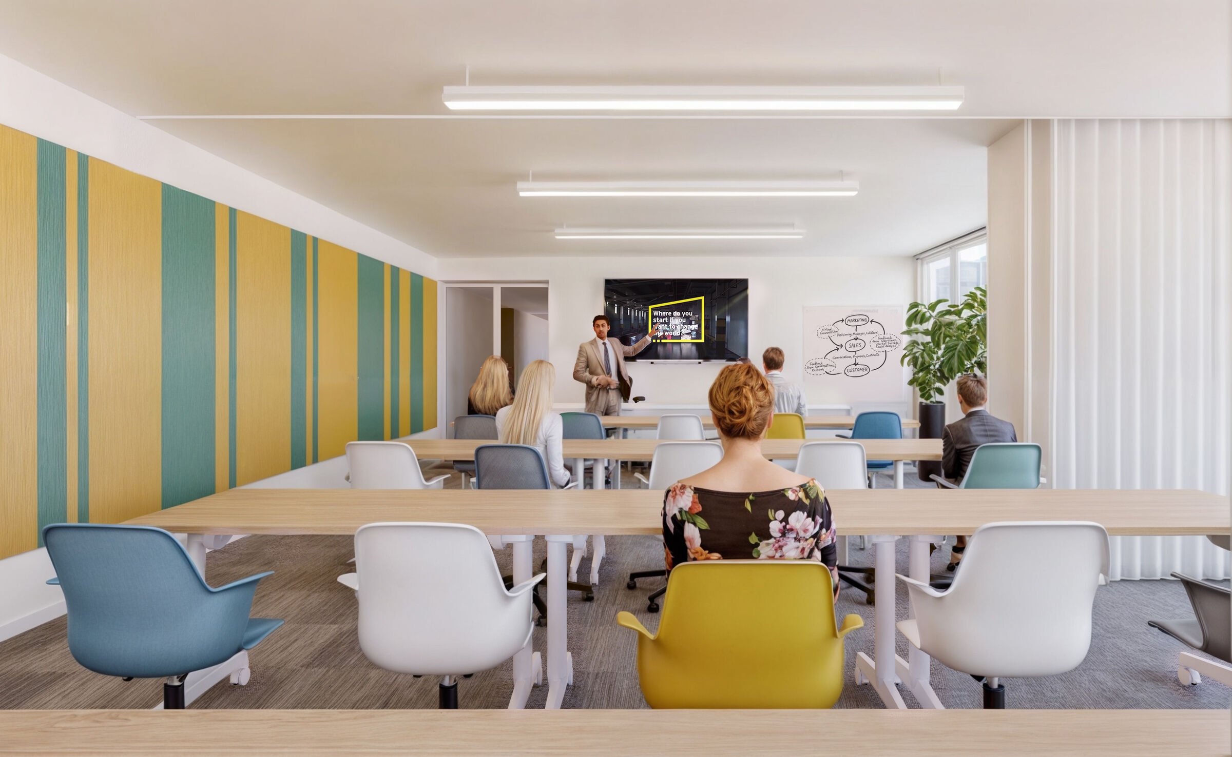 The training room on the first floor: folding tables and chairs on castors allow it to be converted from a classroom into an events space.