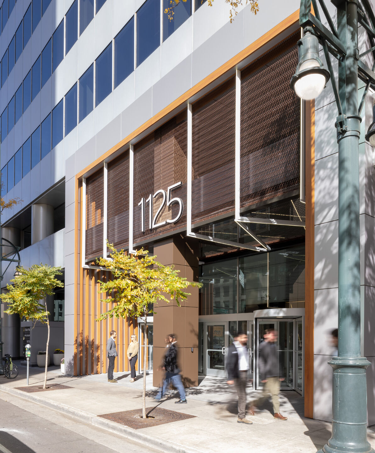 Dune 40100 flexible wire mesh continues the textured design element  from the exterior facade into the welcoming space of the lobby
