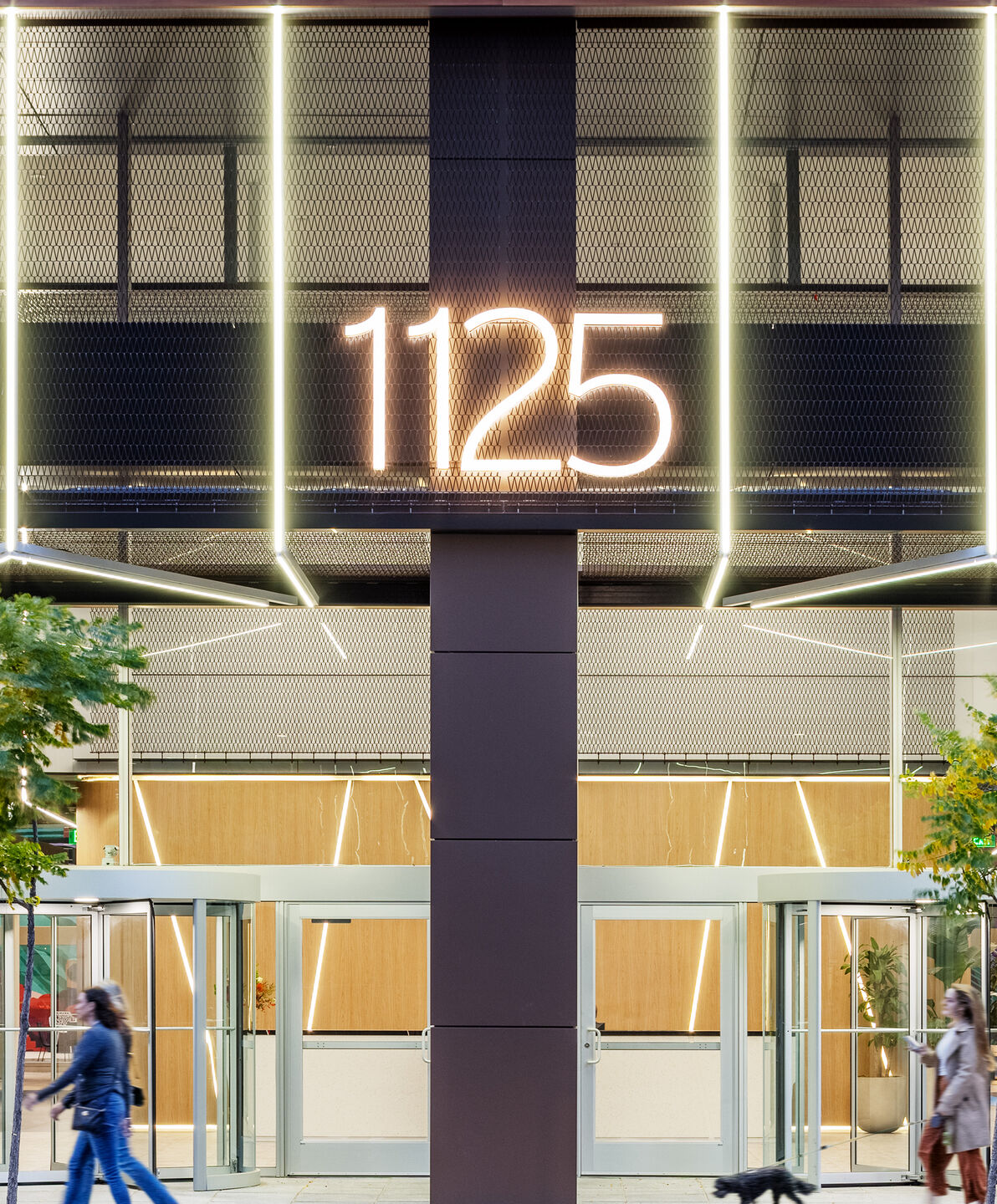 Dune 40100 flexible wire mesh continues the textured design element  from the exterior facade into the welcoming space of the lobby