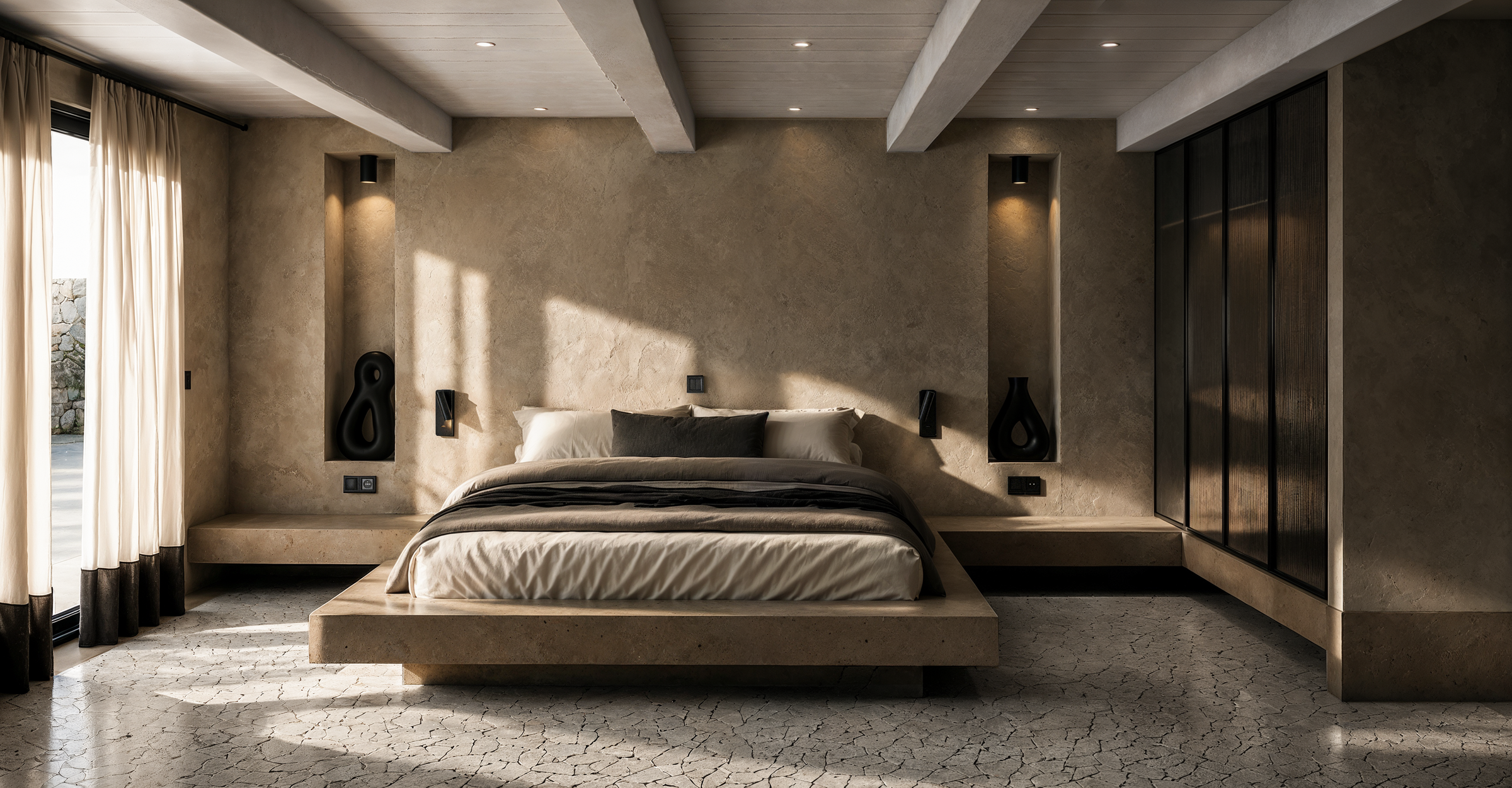 A contemporary bedroom in Karpathos defined by earthy tones, symmetrical composition, and carefully integrated lighting, offering a refined interpretation of Mediterranean residential design.