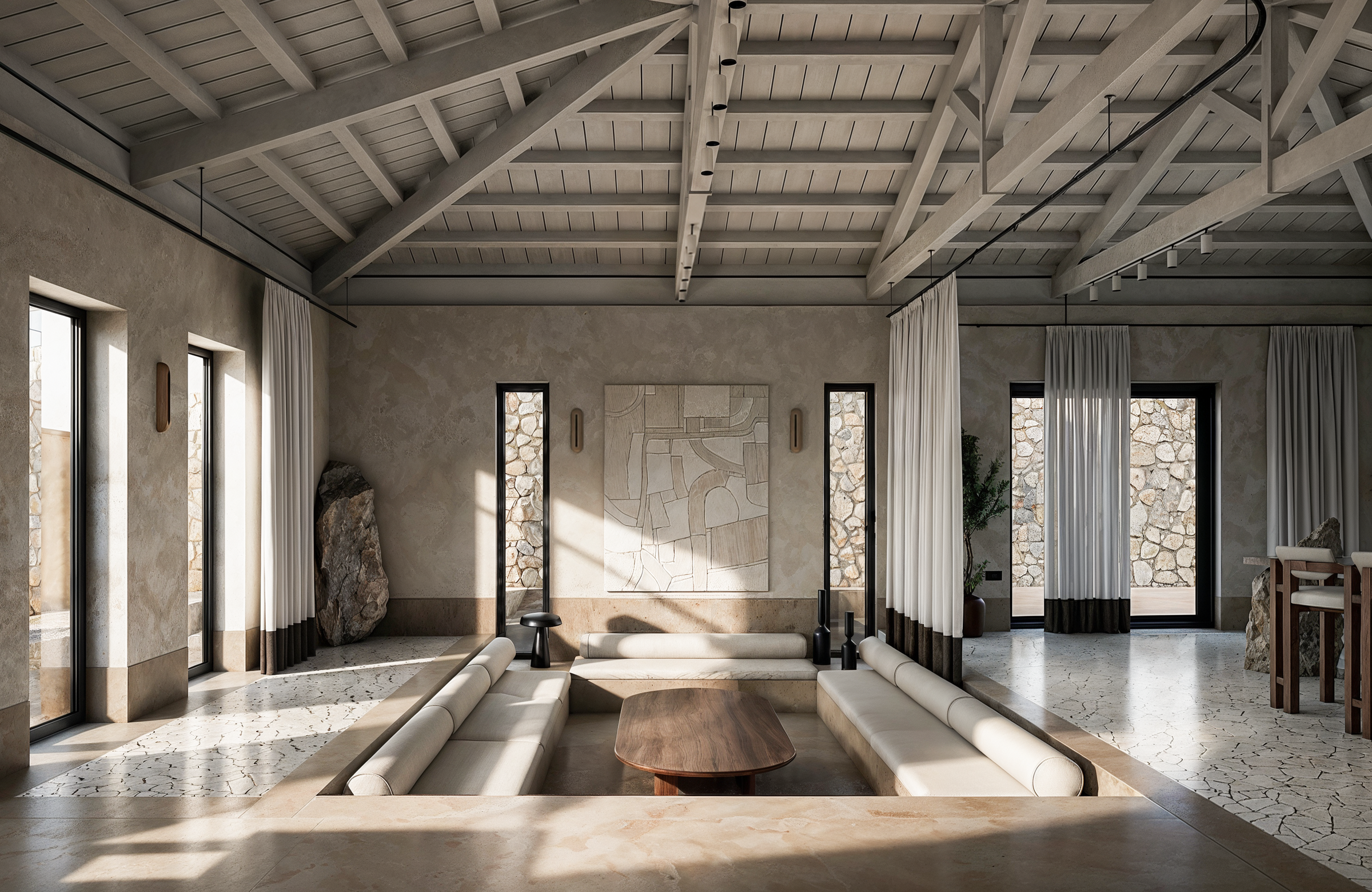 The main living area of Laxevmeni Roe in Karpathos combines traditional roof construction, natural stone, and contemporary architectural detailing to create a timeless residential interior.