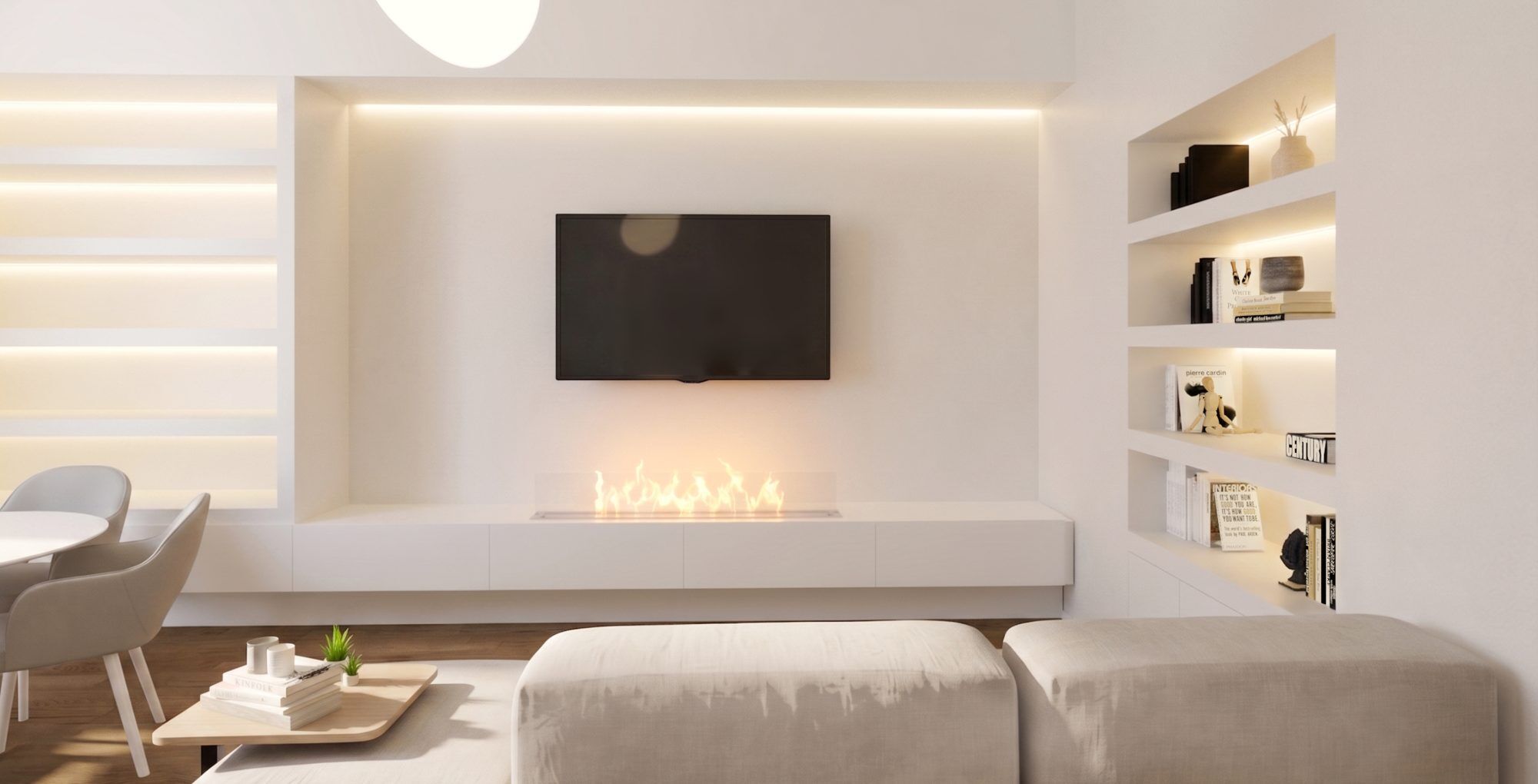 The living room with its white fitted wall unit: a television, a bioethanol fireplace and plasterboard niches with LED lighting.