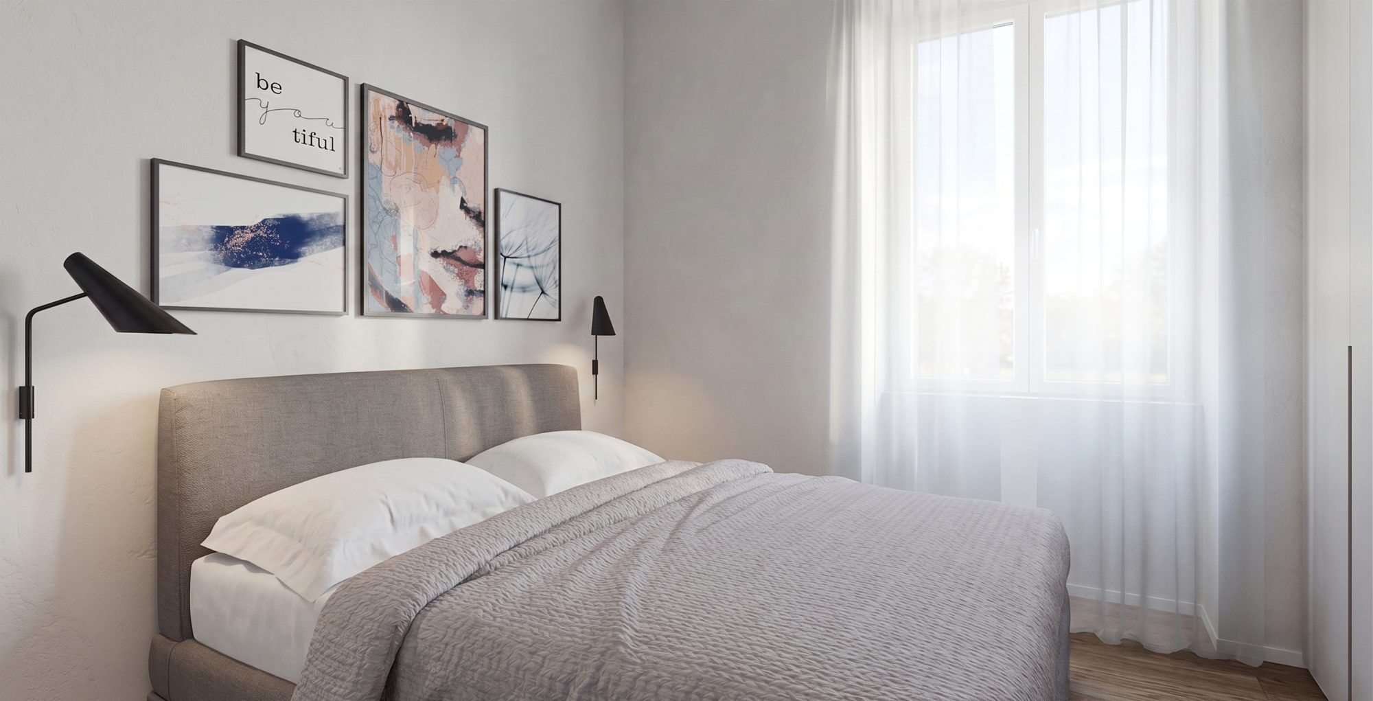 The bedroom, with its upholstered headboard and gallery wall of prints, bathed in natural light.