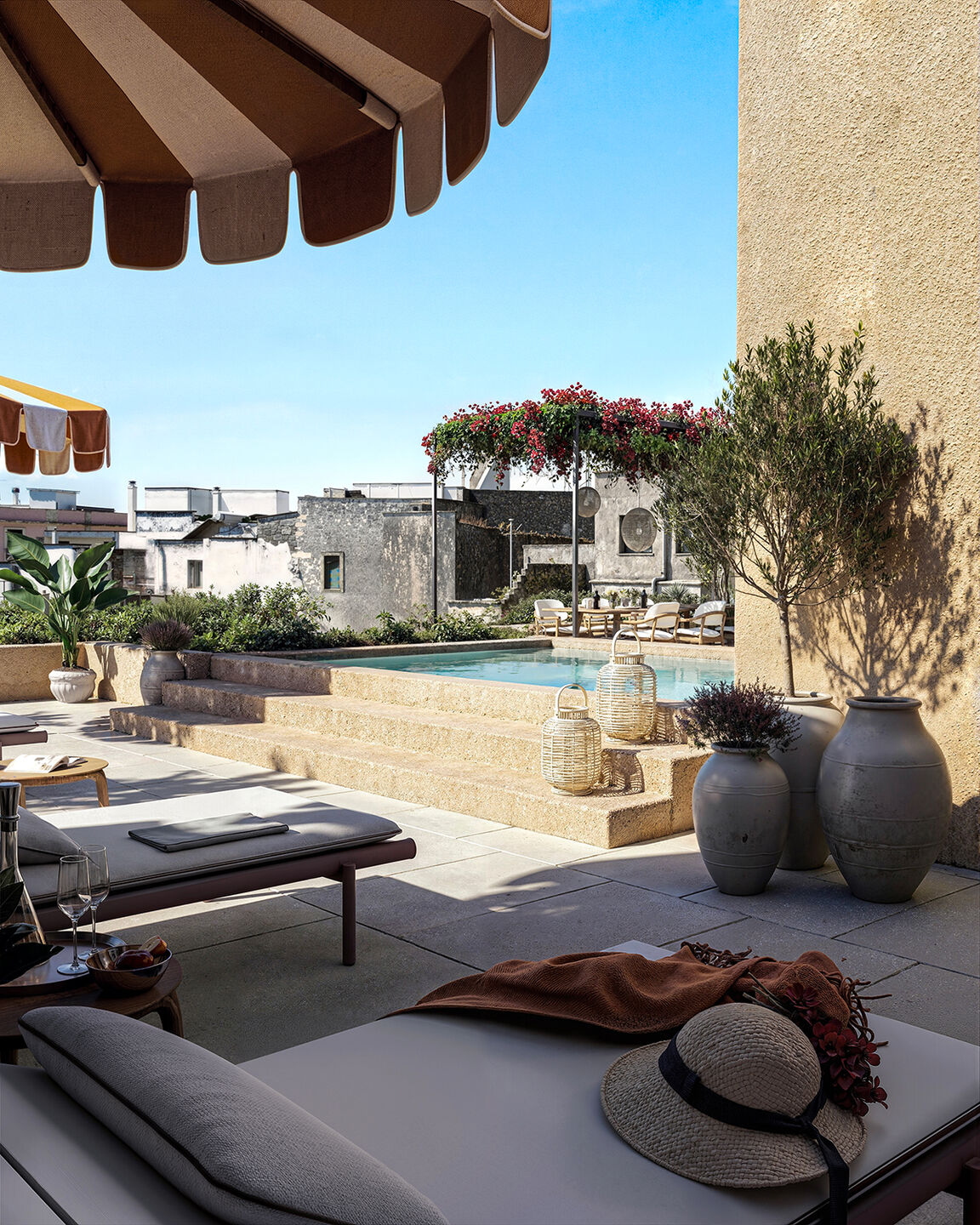 Stone-lined pool within the private courtyard garden