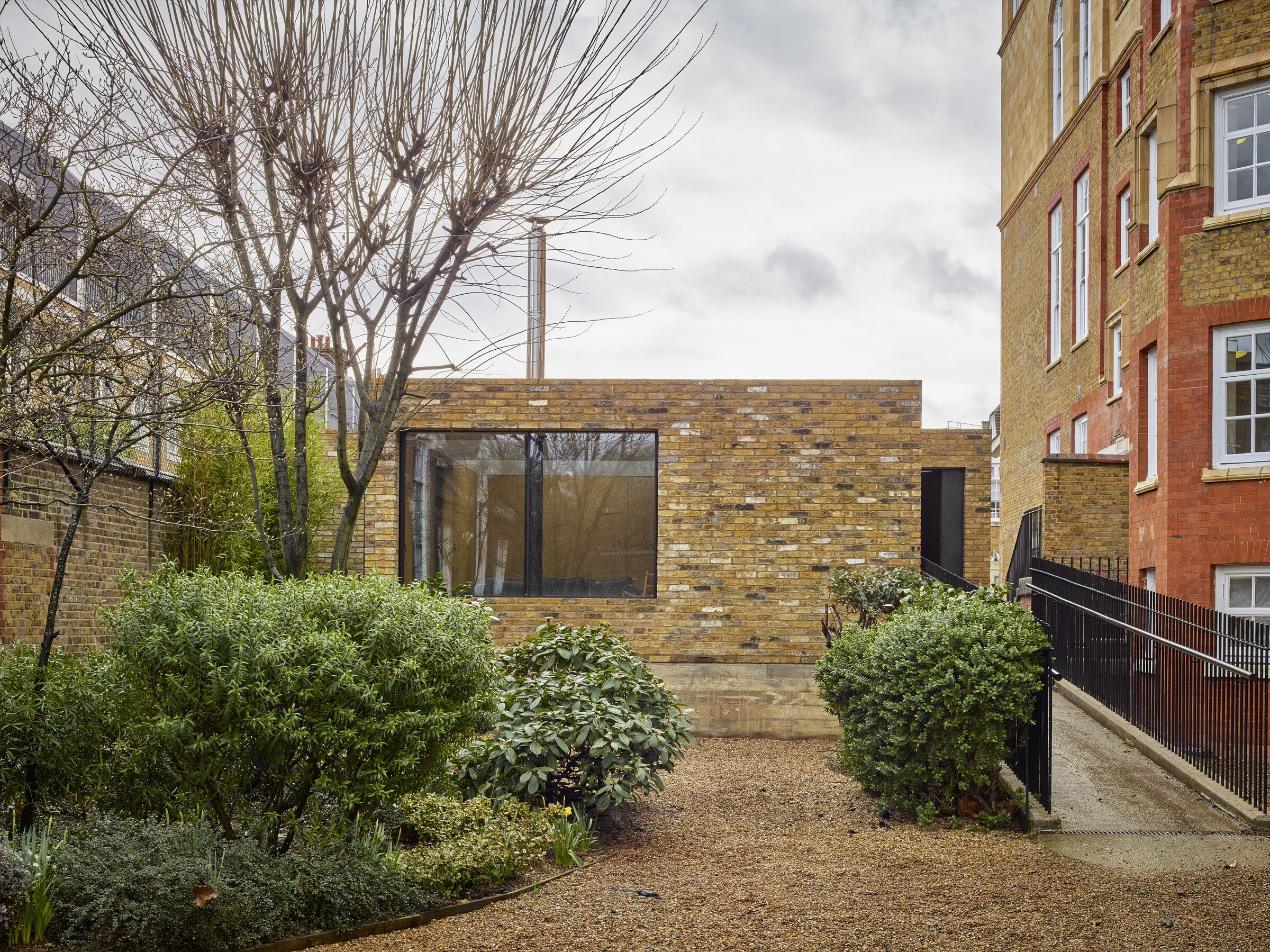 Hidden House is carefully embedded into the Cornish landscape, with natural materials complementing the surrounding coastal setting.