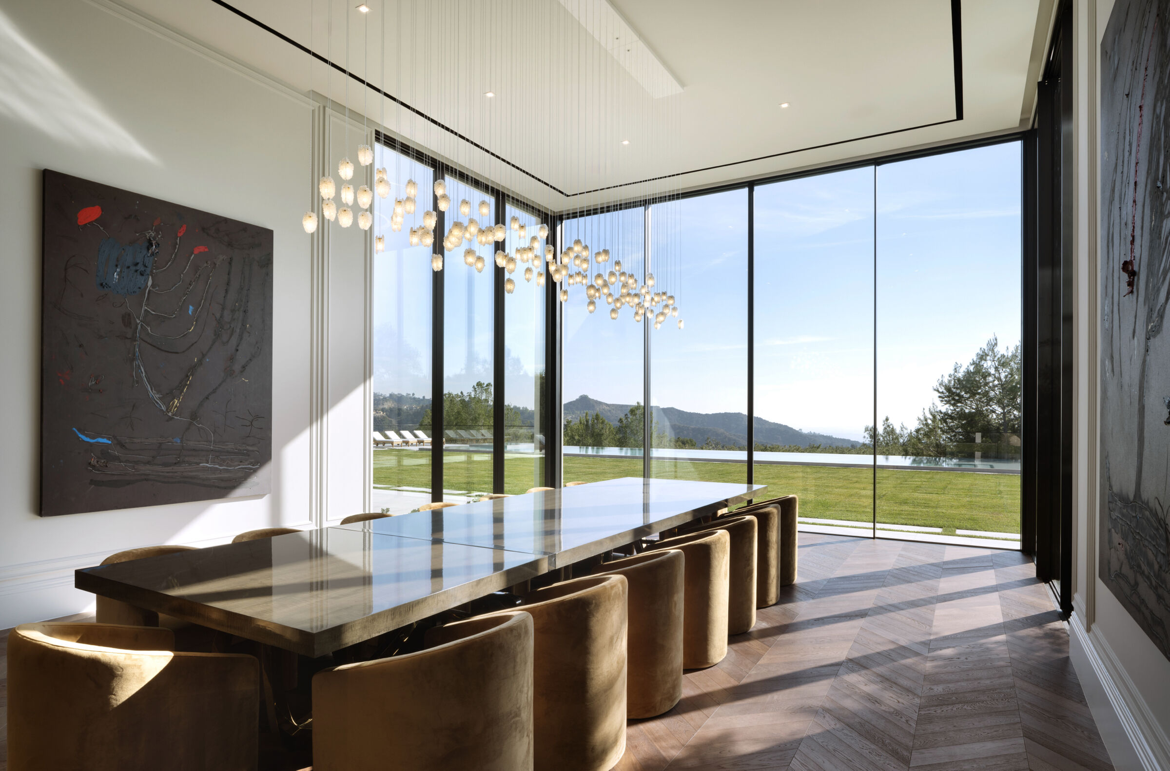 Transparent art glass creates an airy sculptural presence within the architecture.