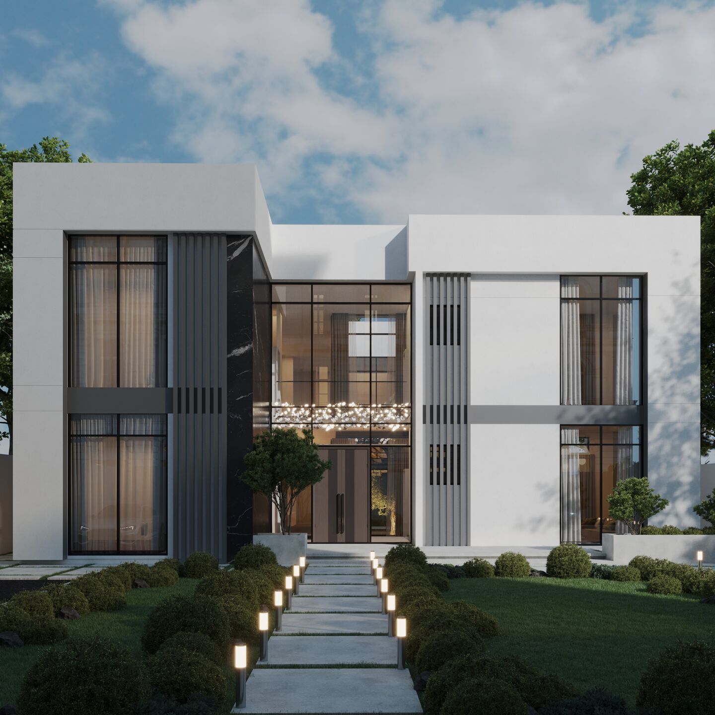 Principal elevation showing the double-height glazed entrance and landscaped approach.